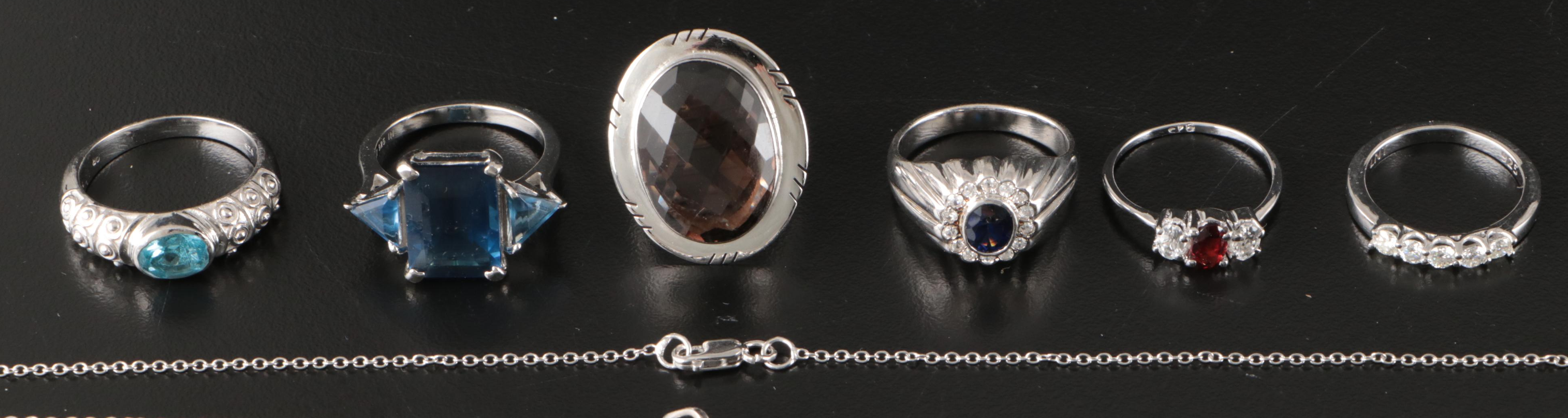 Group of 14 Assorted Sterling Silver Rings, Necklaces, Earrings, and Pendants