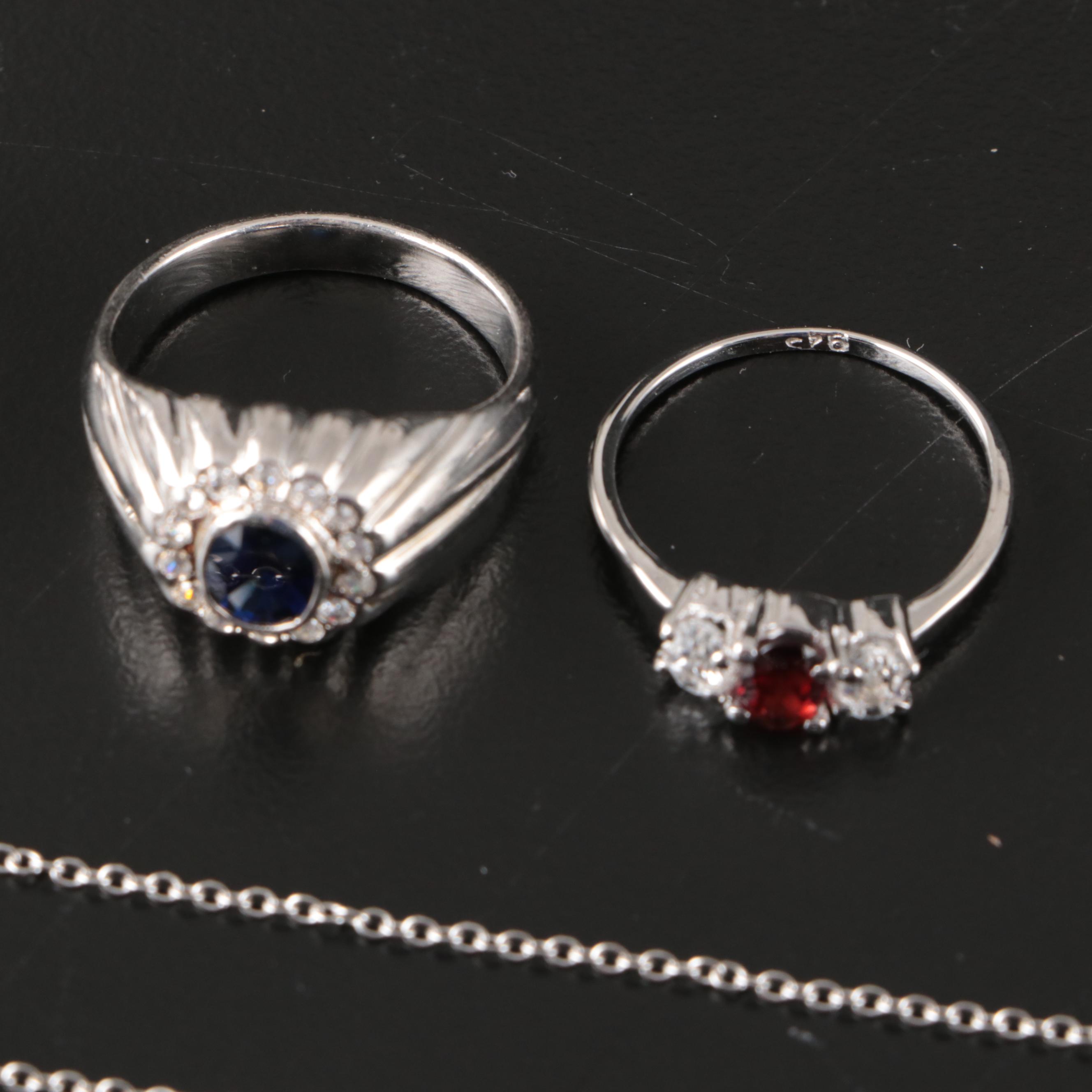 Group of 14 Assorted Sterling Silver Rings, Necklaces, Earrings, and Pendants