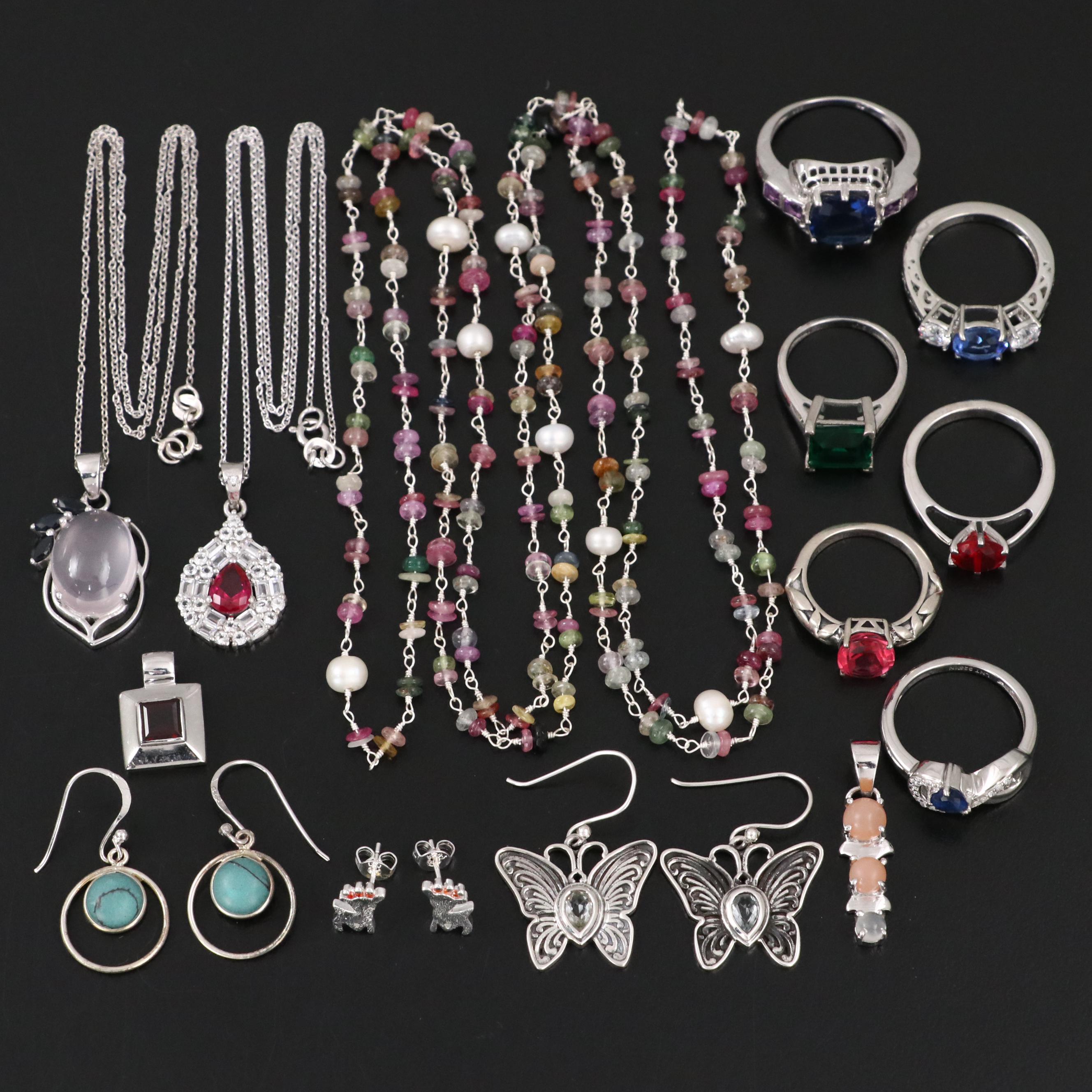Group of 14 Assorted Sterling Silver Rings, Necklaces, Earrings, and Pendants