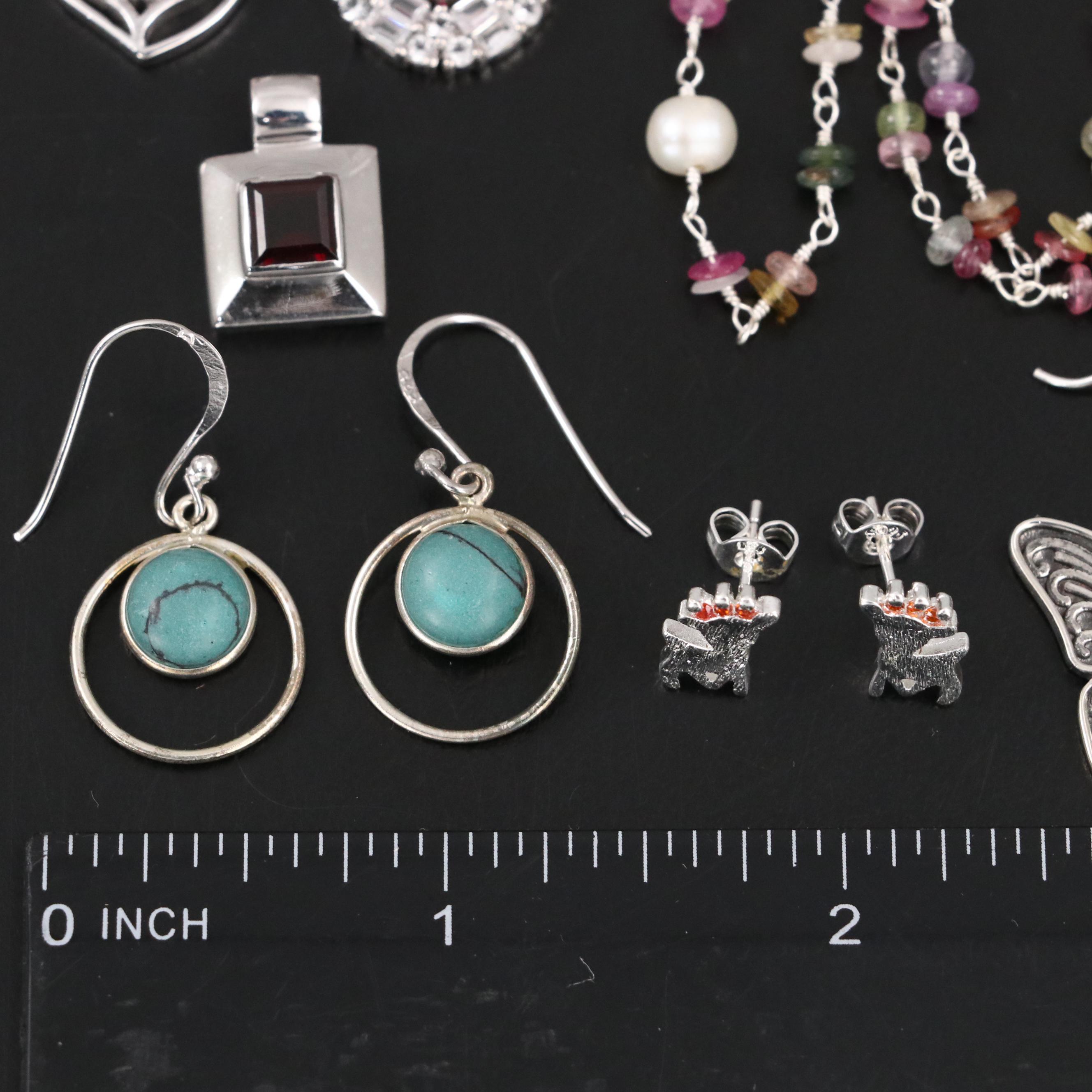 Group of 14 Assorted Sterling Silver Rings, Necklaces, Earrings, and Pendants