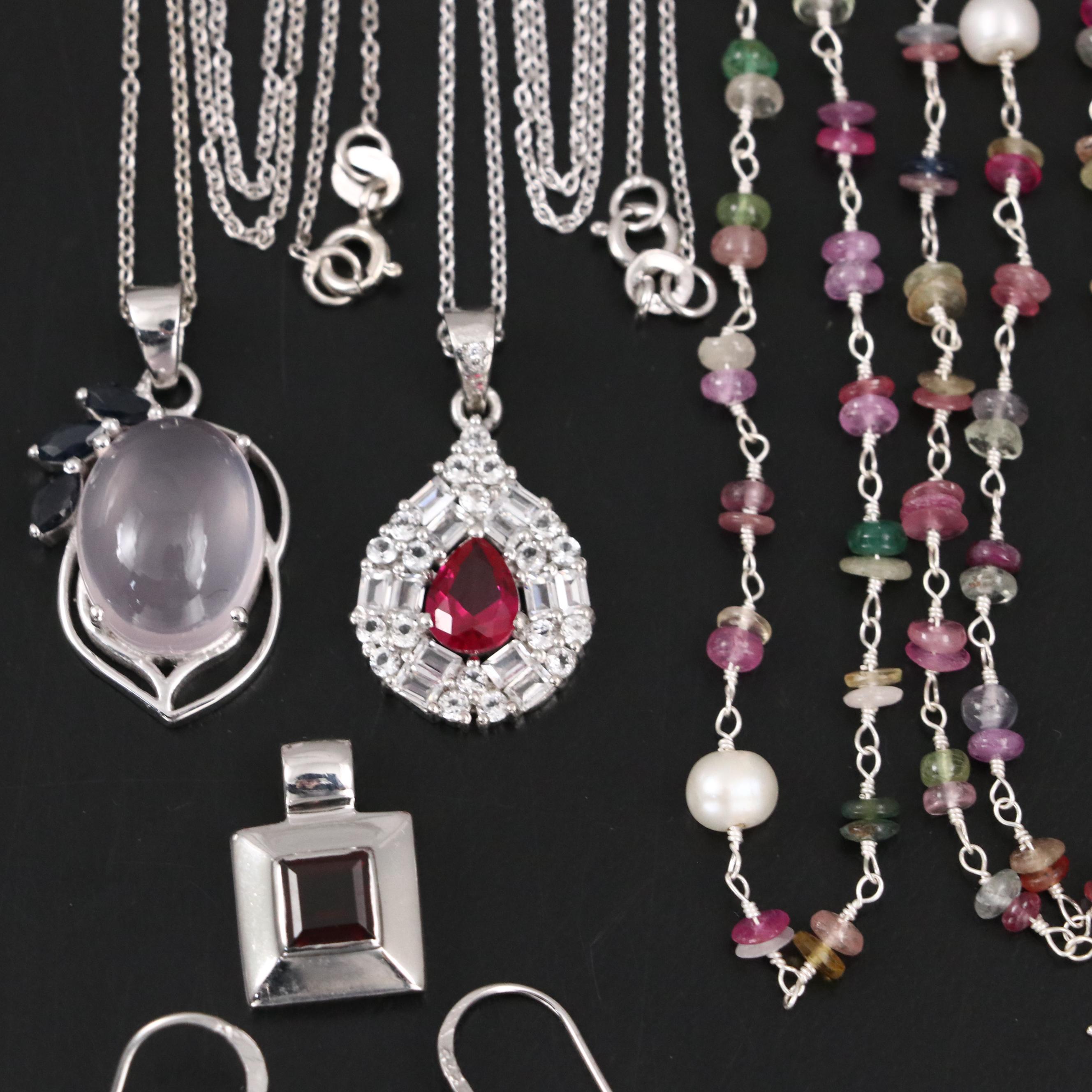 Group of 14 Assorted Sterling Silver Rings, Necklaces, Earrings, and Pendants