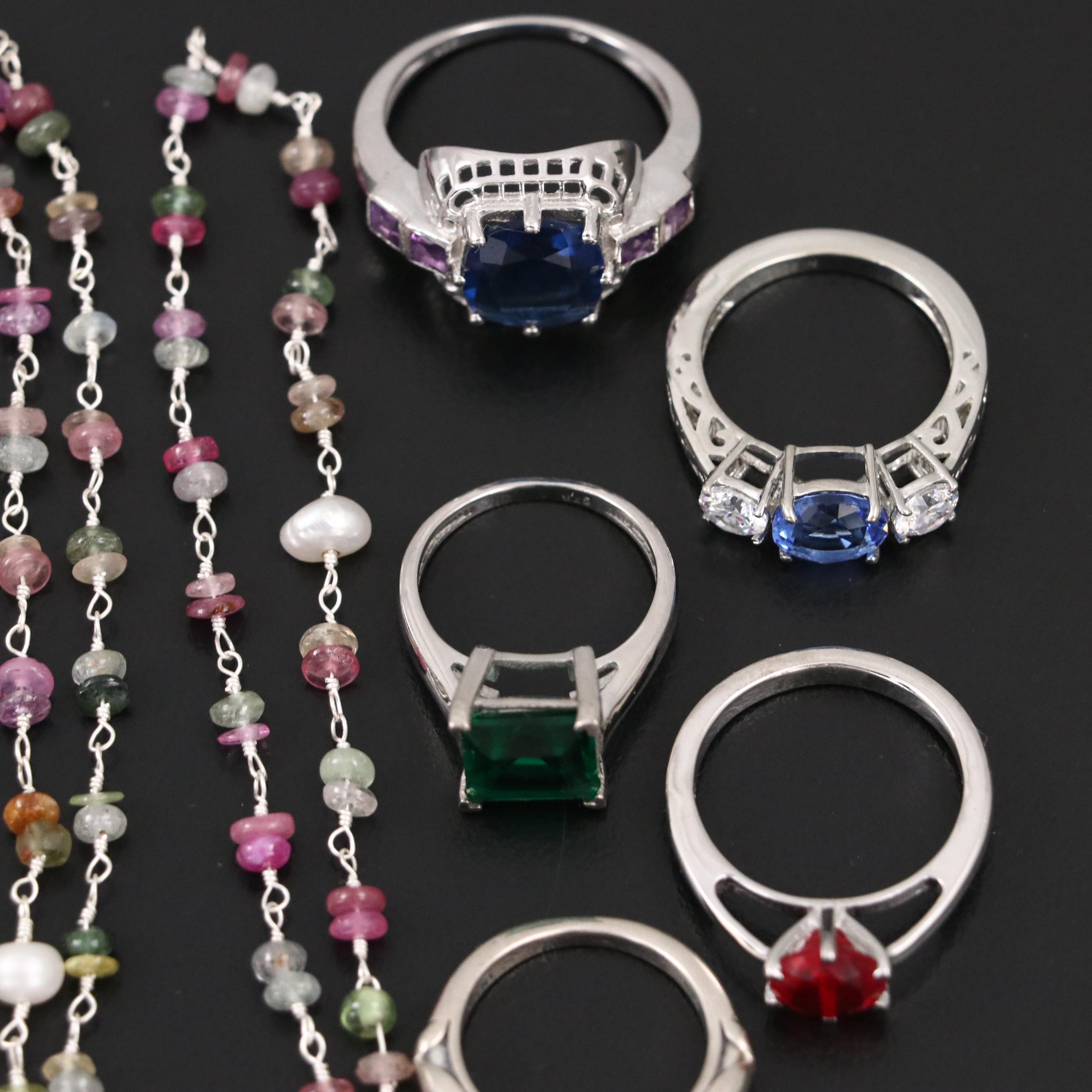 Group of 14 Assorted Sterling Silver Rings, Necklaces, Earrings, and Pendants