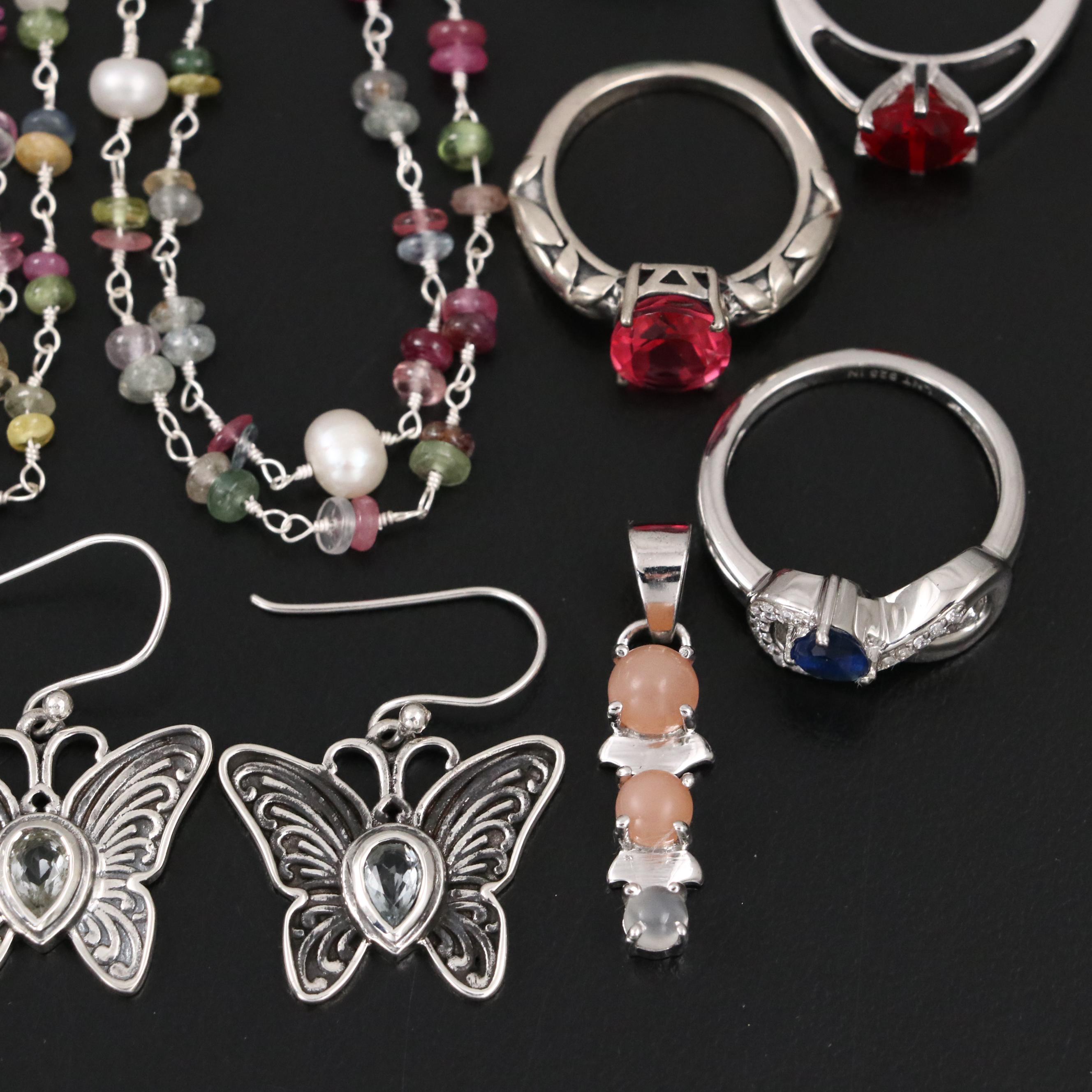 Group of 14 Assorted Sterling Silver Rings, Necklaces, Earrings, and Pendants