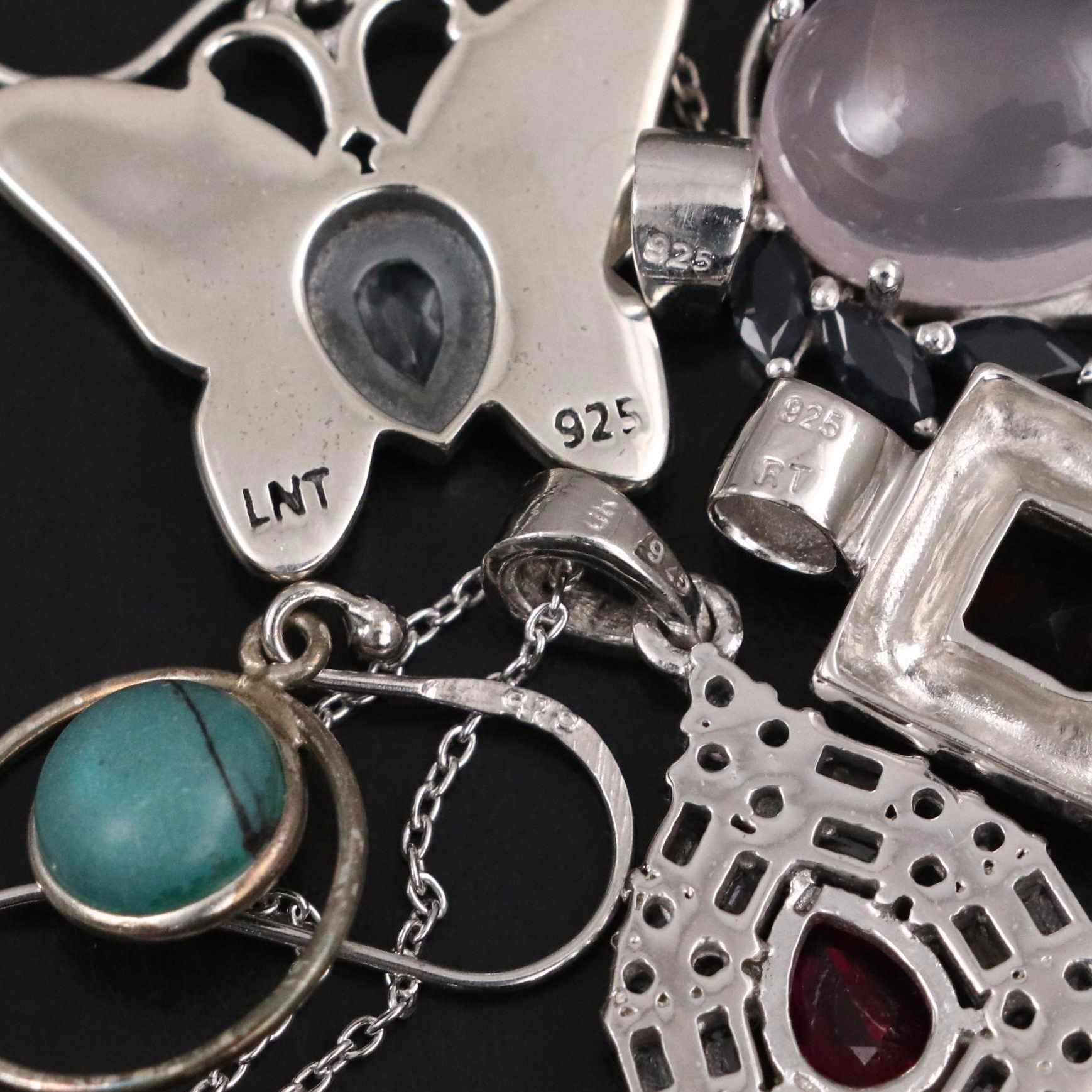 Group of 14 Assorted Sterling Silver Rings, Necklaces, Earrings, and Pendants