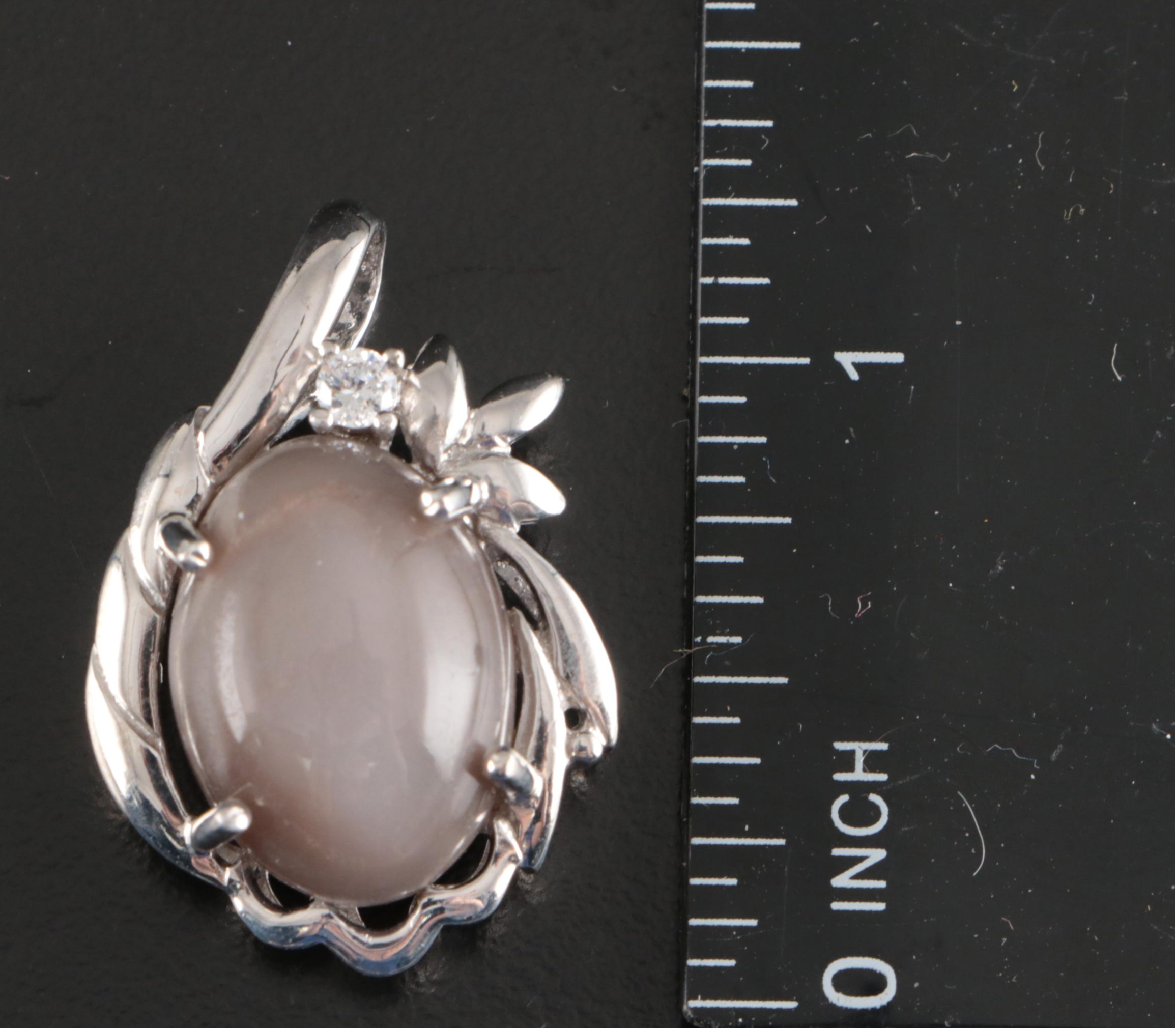 Group of 14 Assorted Sterling Silver Rings, Necklaces, Earrings, and Pendants