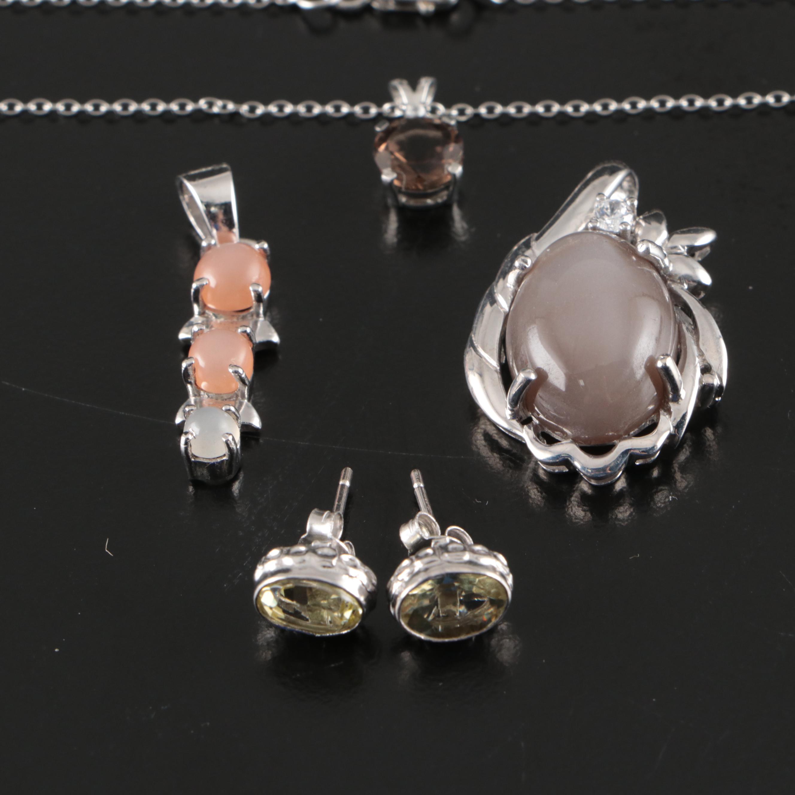 Group of 14 Assorted Sterling Silver Rings, Necklaces, Earrings, and Pendants