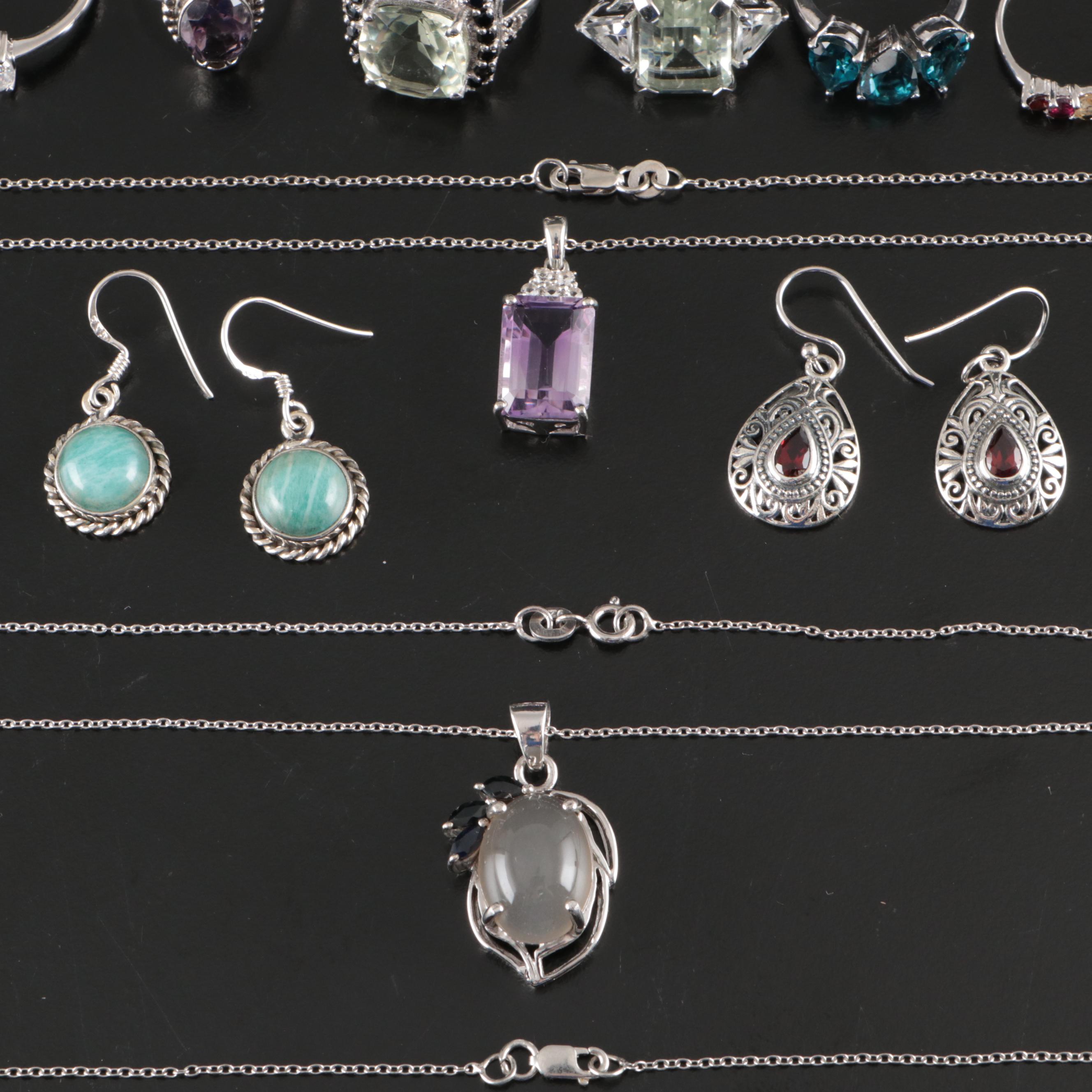 Group of 14 Assorted Sterling Silver Rings, Necklaces, Earrings, and Pendants