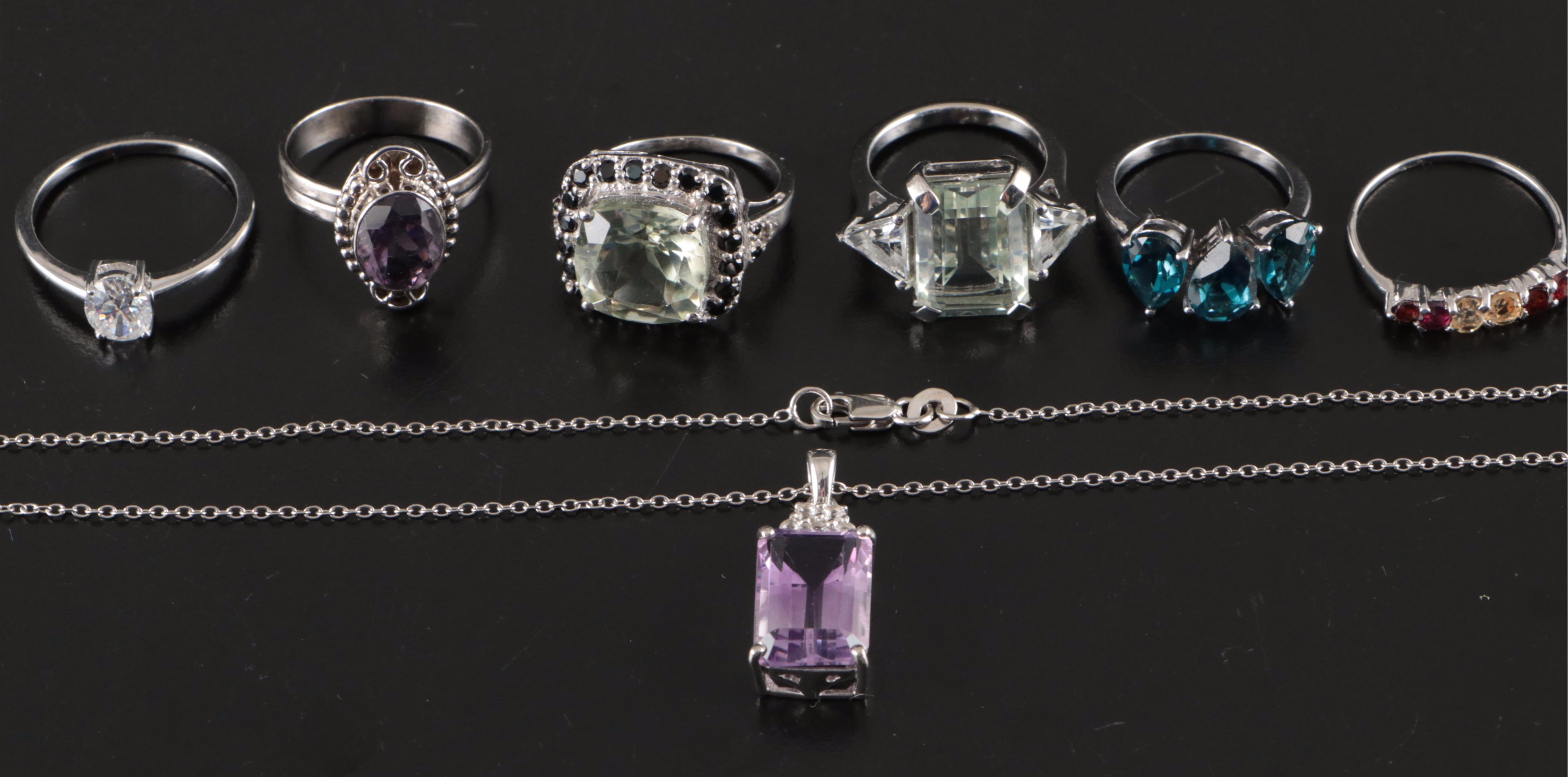 Group of 14 Assorted Sterling Silver Rings, Necklaces, Earrings, and Pendants