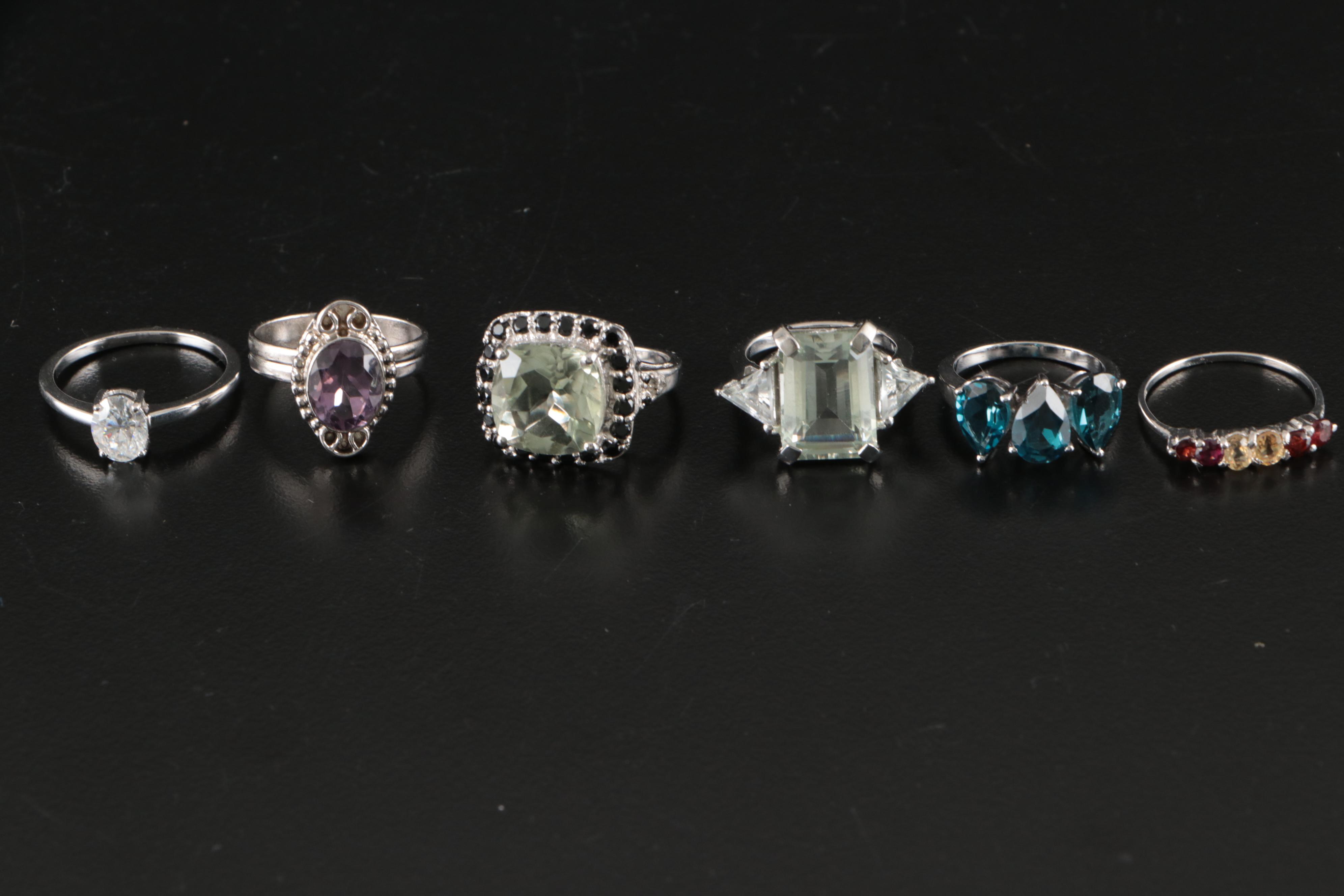 Group of 14 Assorted Sterling Silver Rings, Necklaces, Earrings, and Pendants