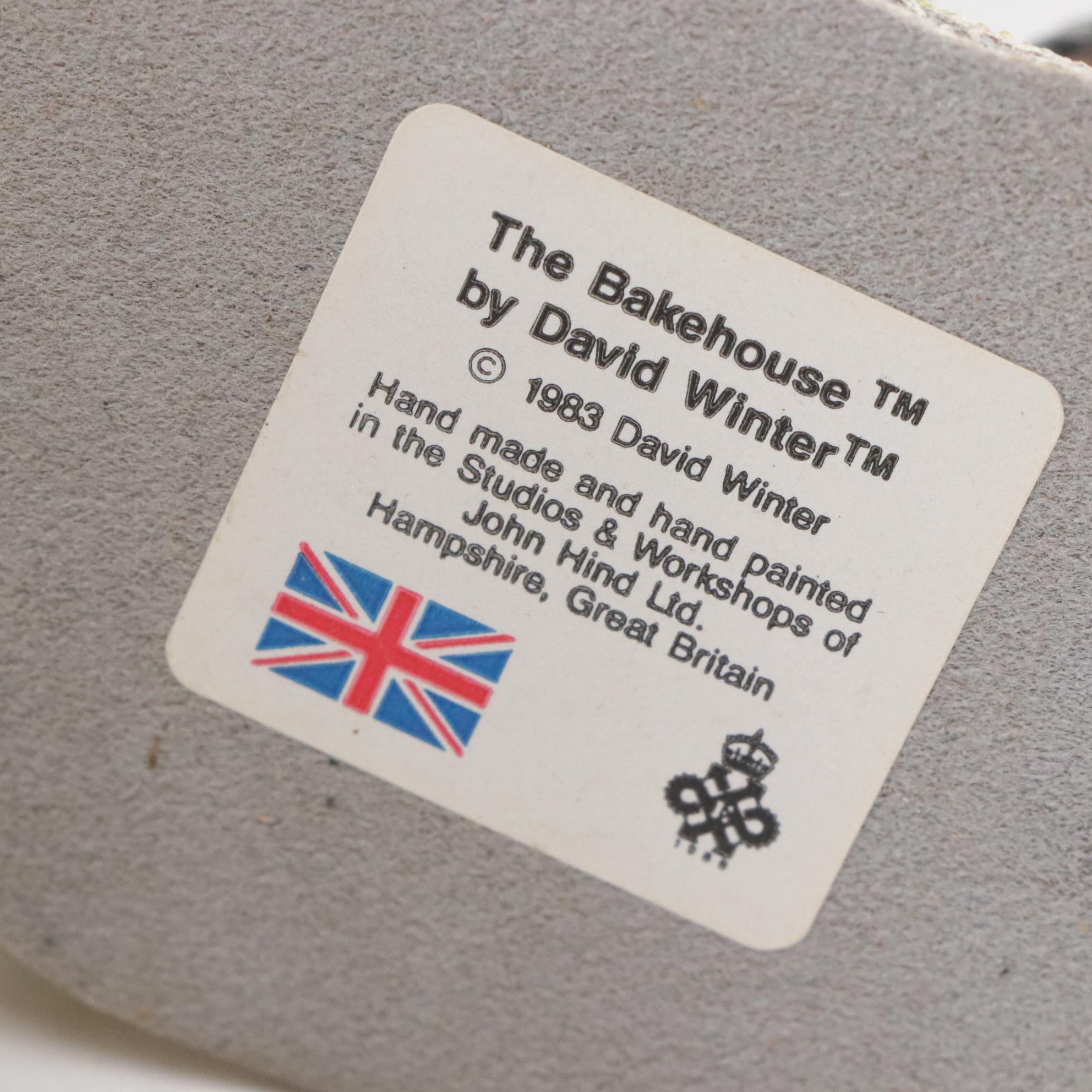 David Winter From Enesco Resin Cottages and Houses Featuring "Wine Merchant"