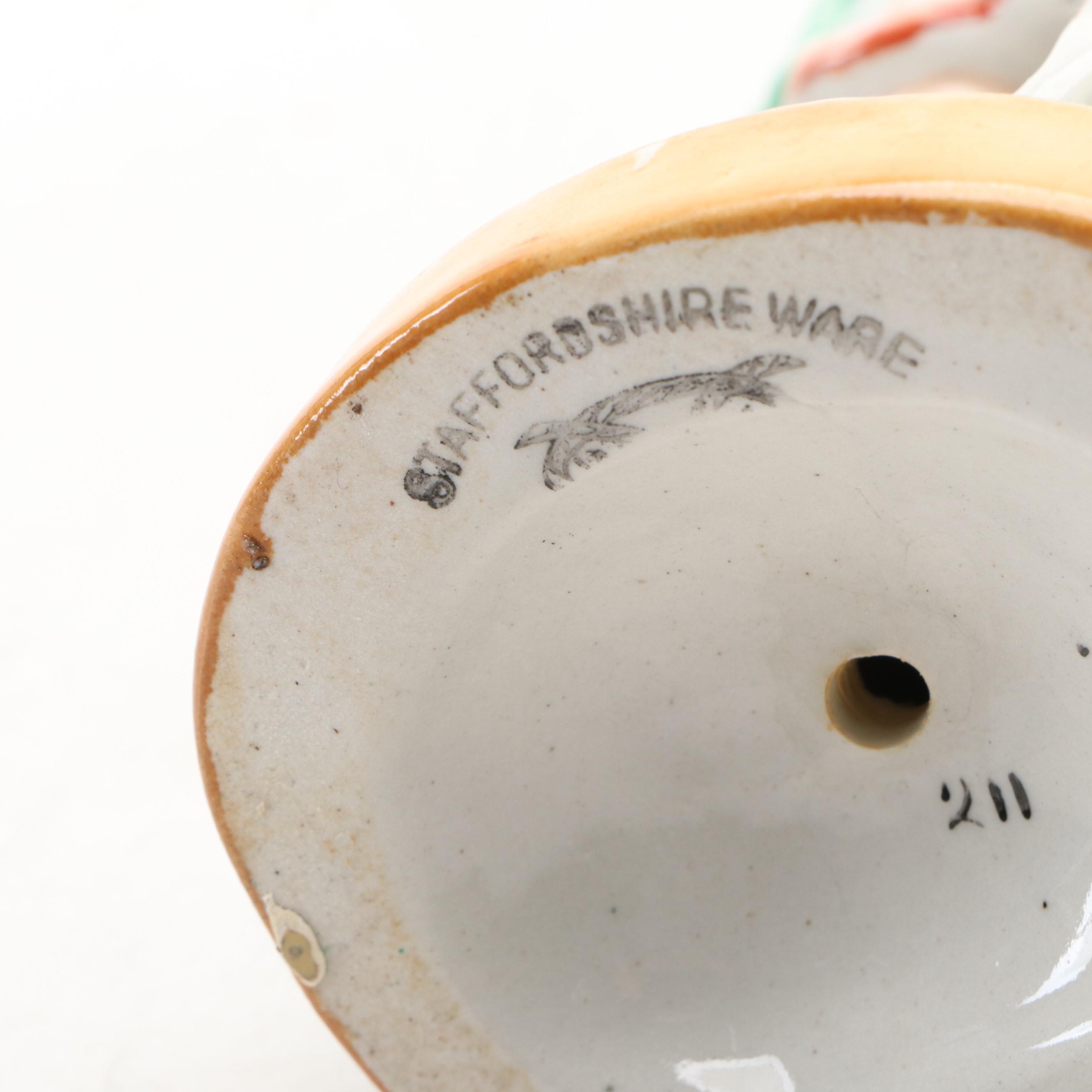 William Kent Staffordshire Ware Higland Man and Woman with Dogs Figurines