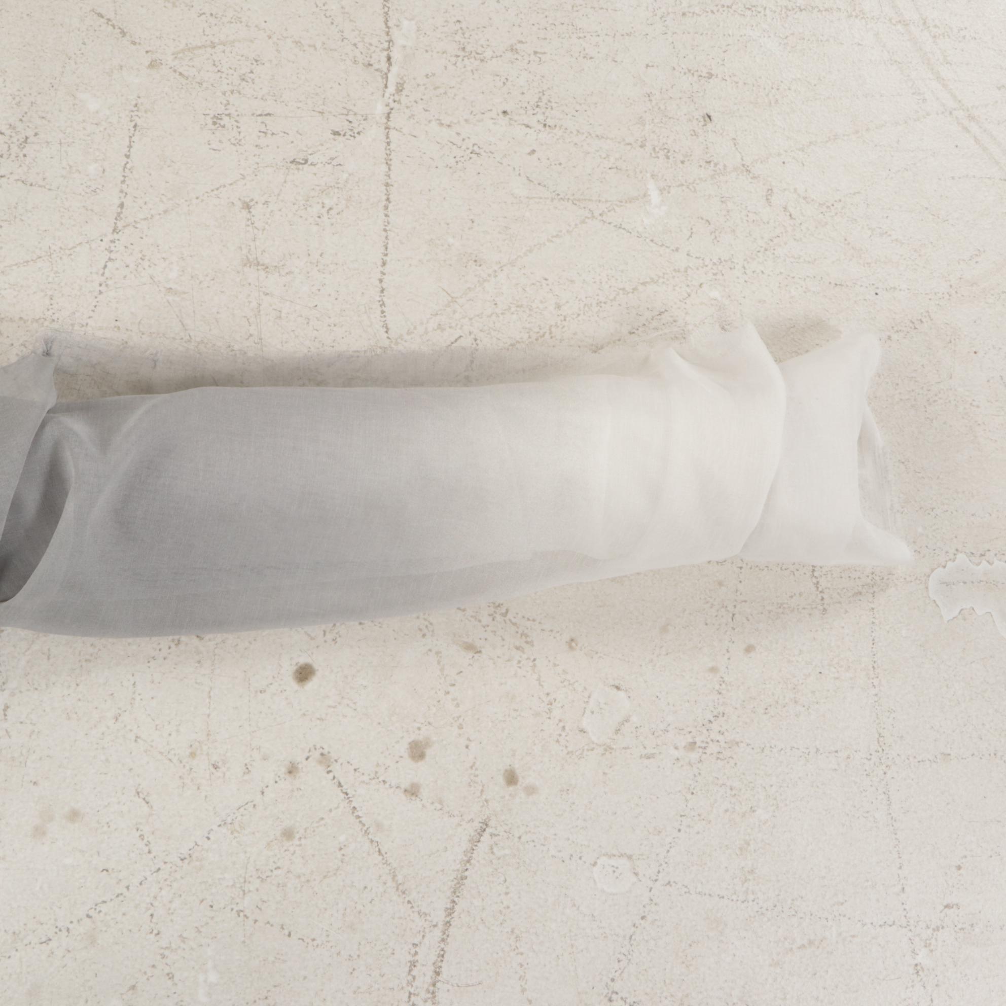 Sheer Gray Ombre and Felt Style Dark Gray Fabric Bolts