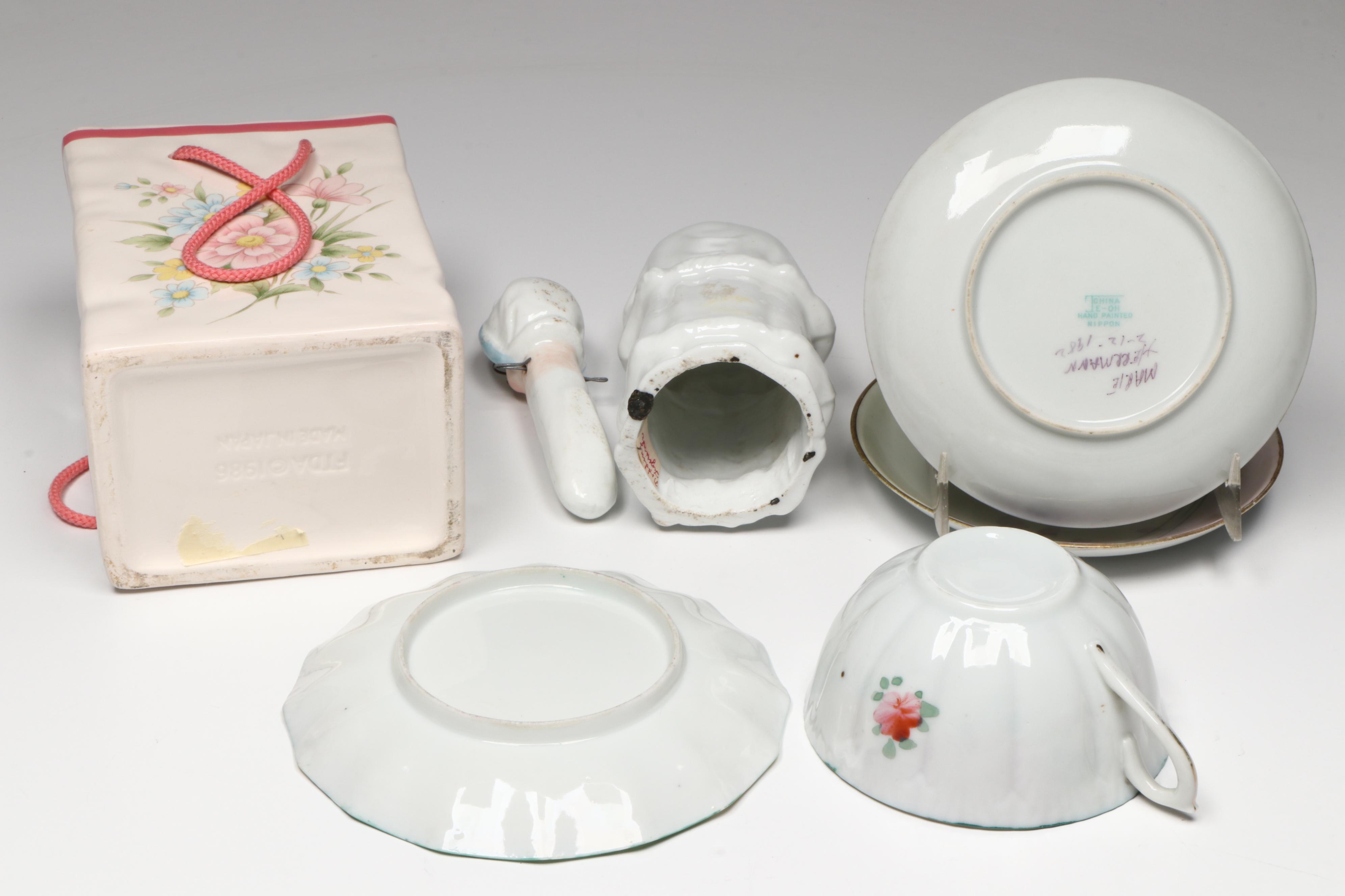 Teleflora Gifts Ceramic Vase, Nippon Porcelain Saucers, and Other Table Décor