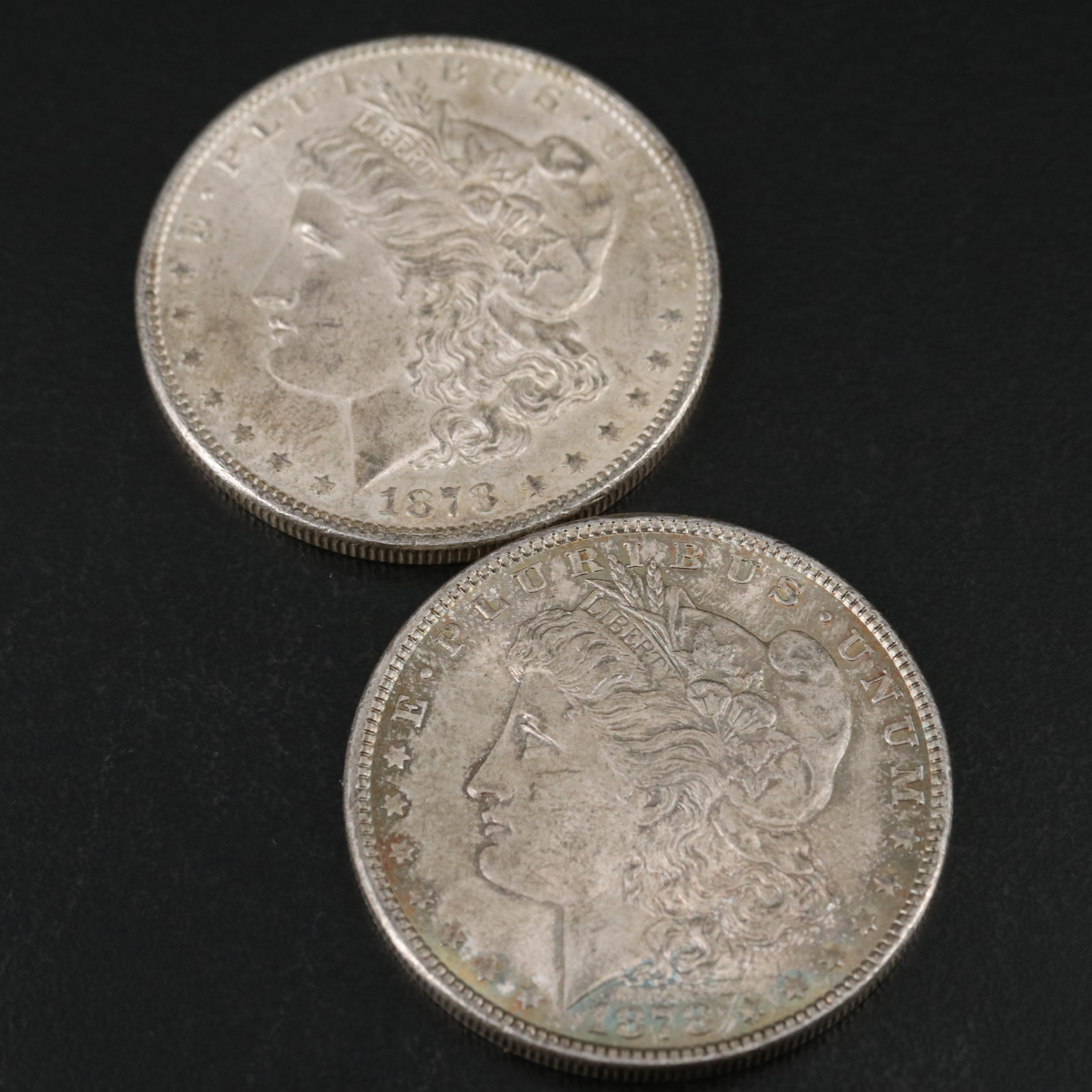 Two 1878 Seven Tail Feathers Morgan Dollars