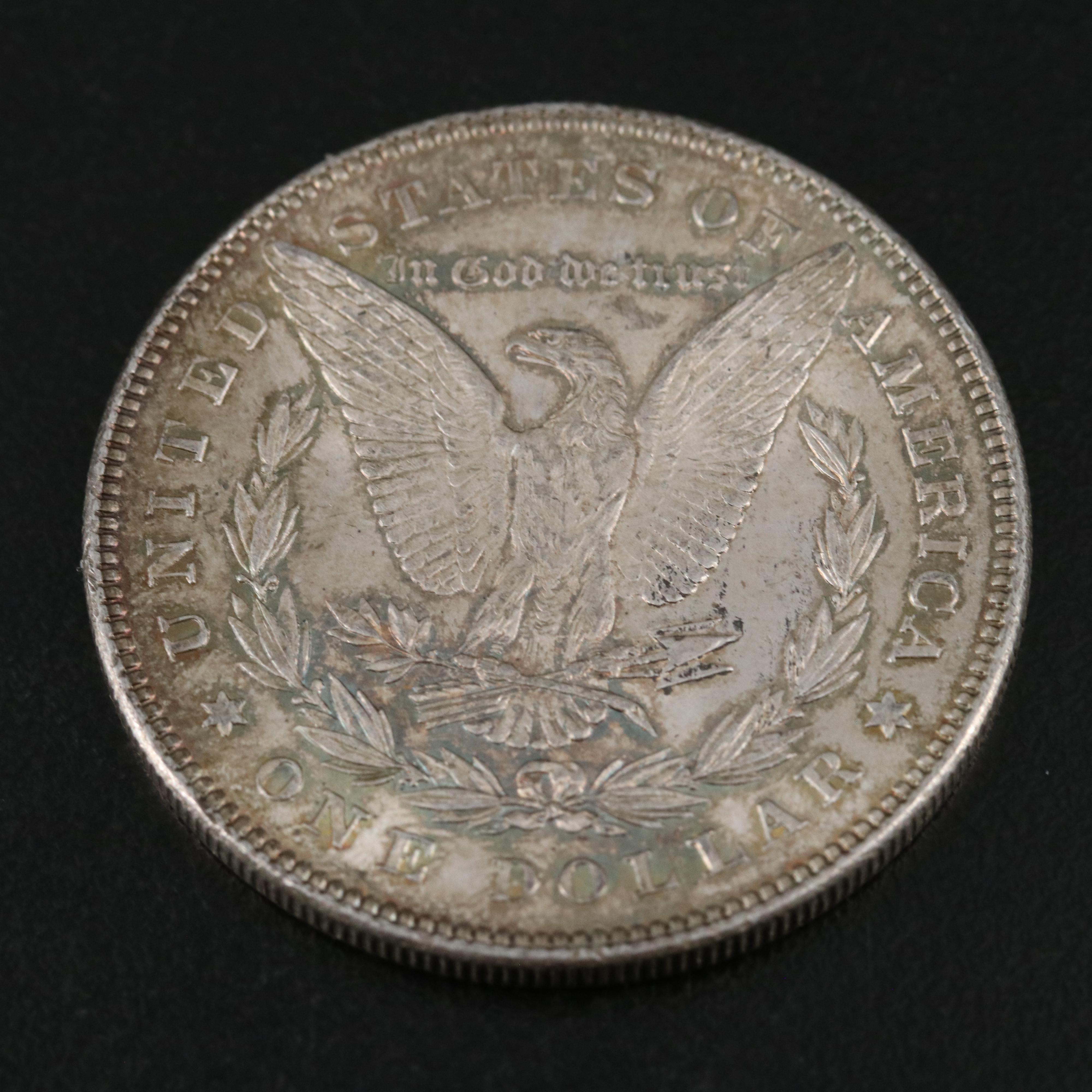 Two 1878 Seven Tail Feathers Morgan Dollars