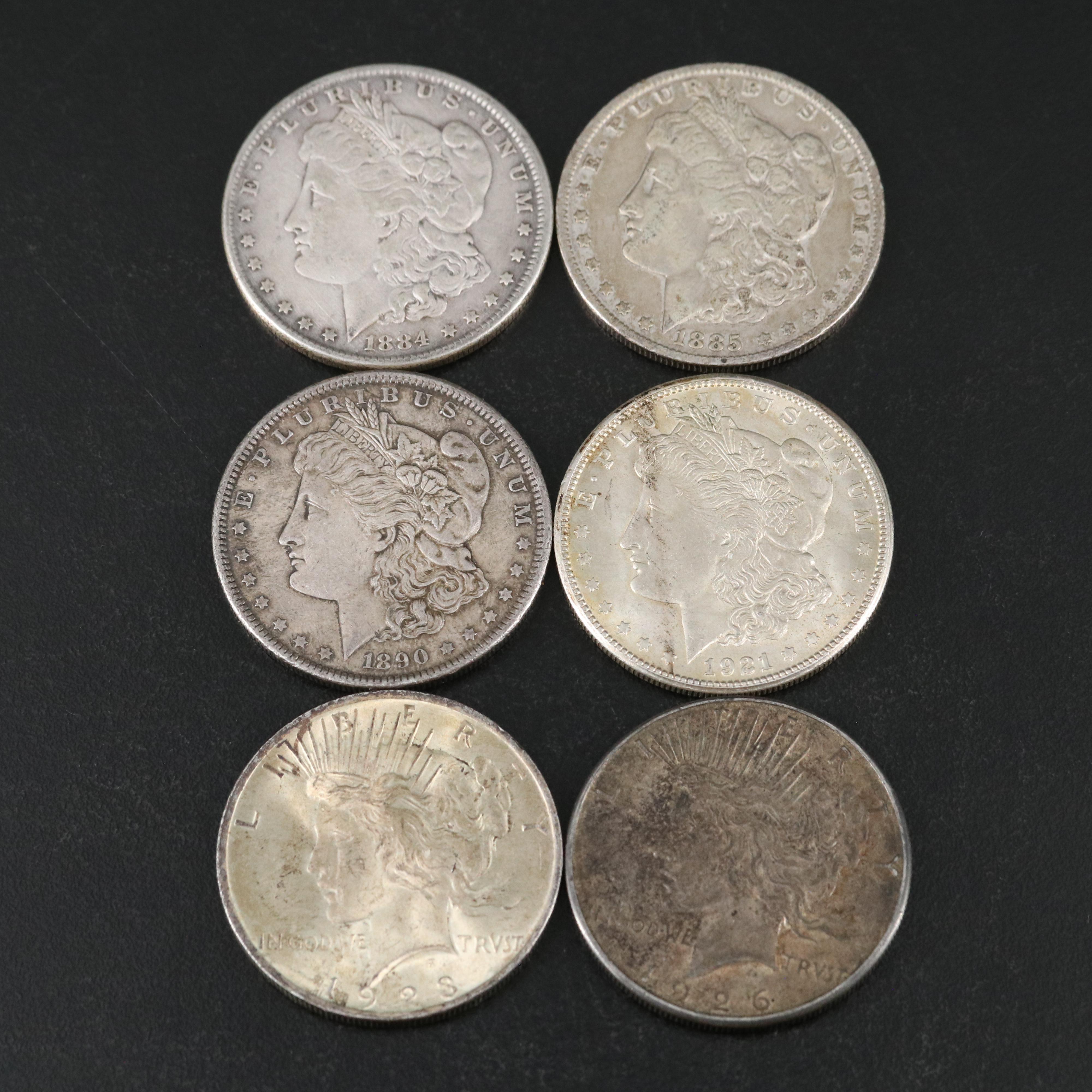 Six U.S. Morgan and Peace Dollars