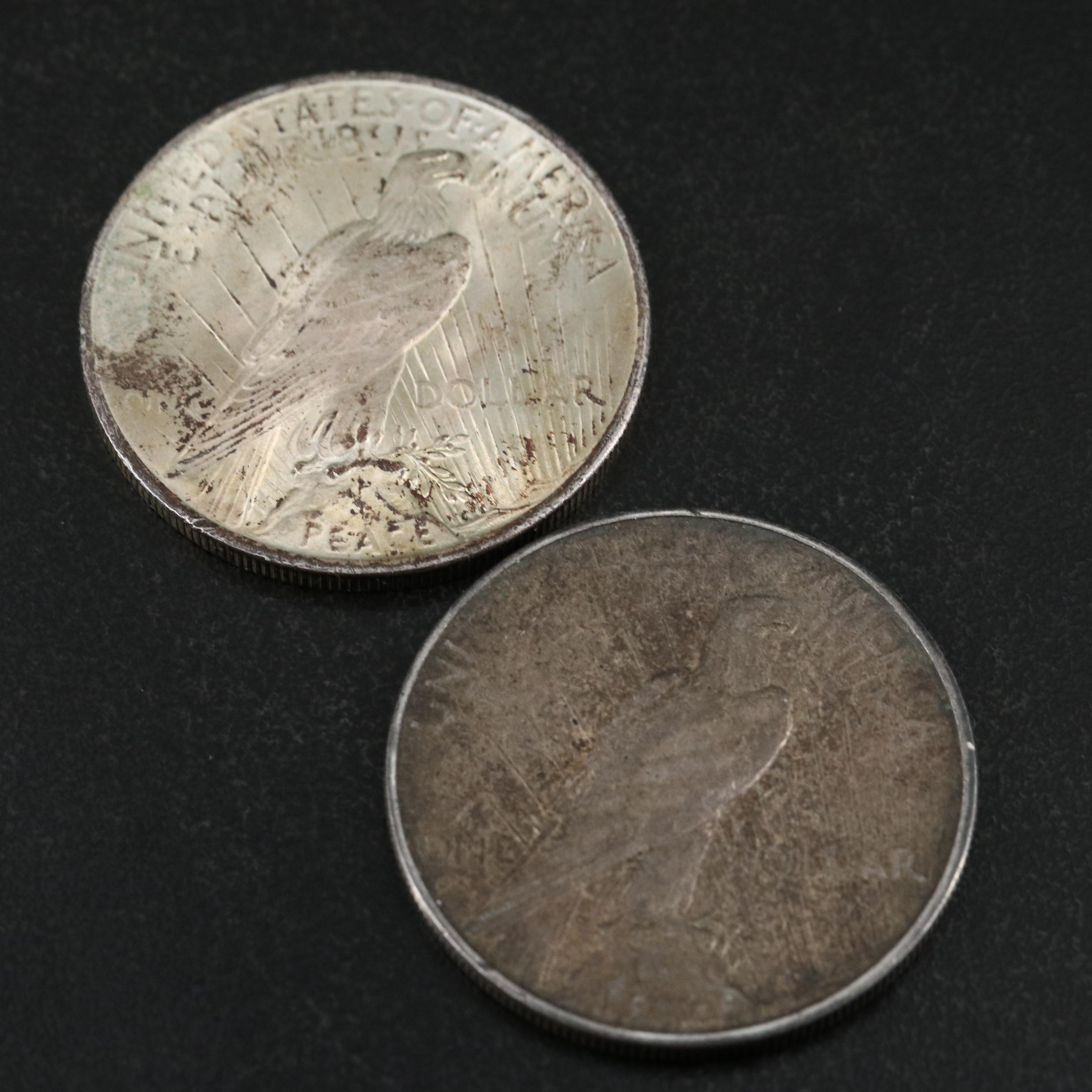 Six U.S. Morgan and Peace Dollars