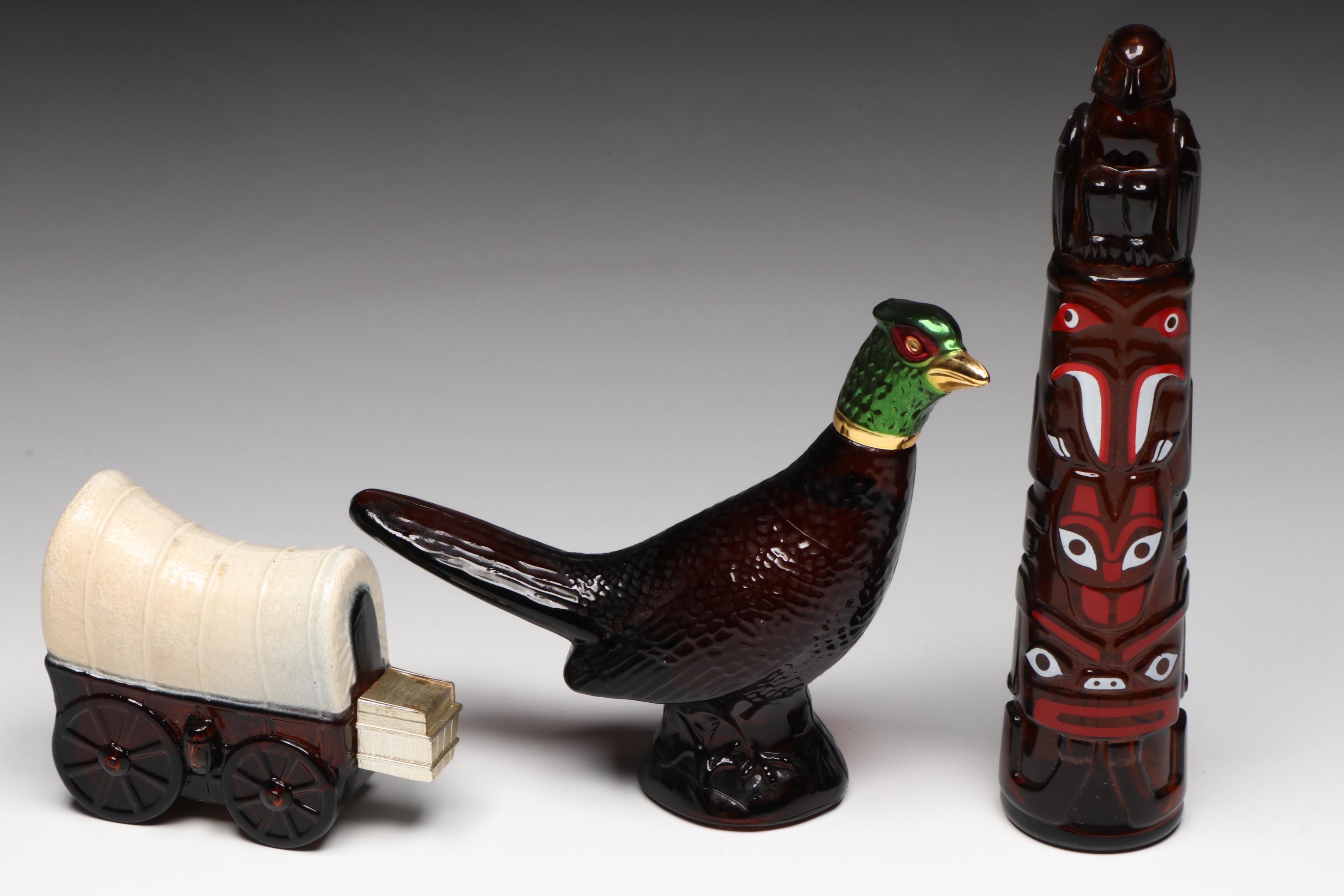 Avon Novelty Aftershave Bottles Including Revolver, Pheasant, and Totem Pole