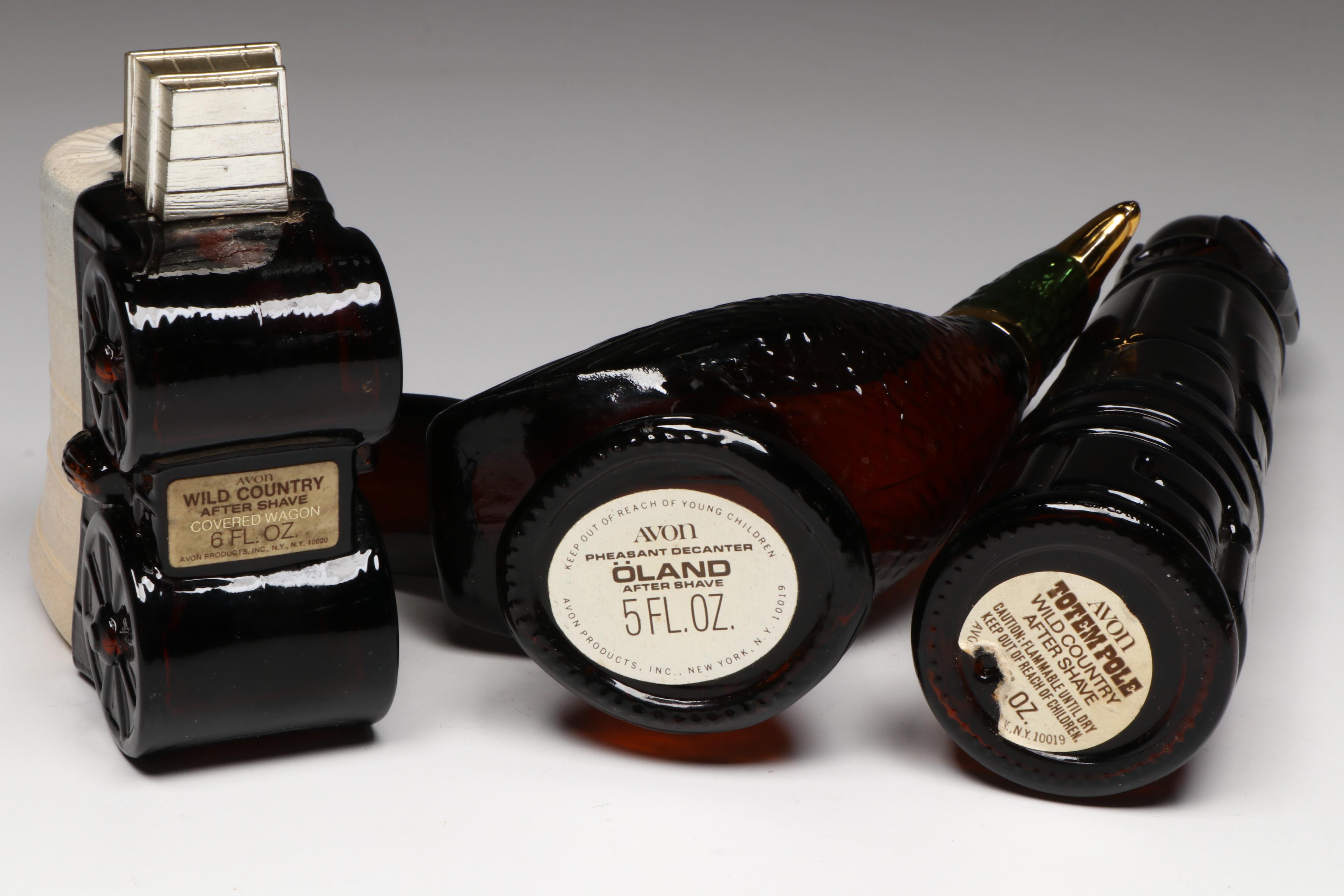 Avon Novelty Aftershave Bottles Including Revolver, Pheasant, and Totem Pole