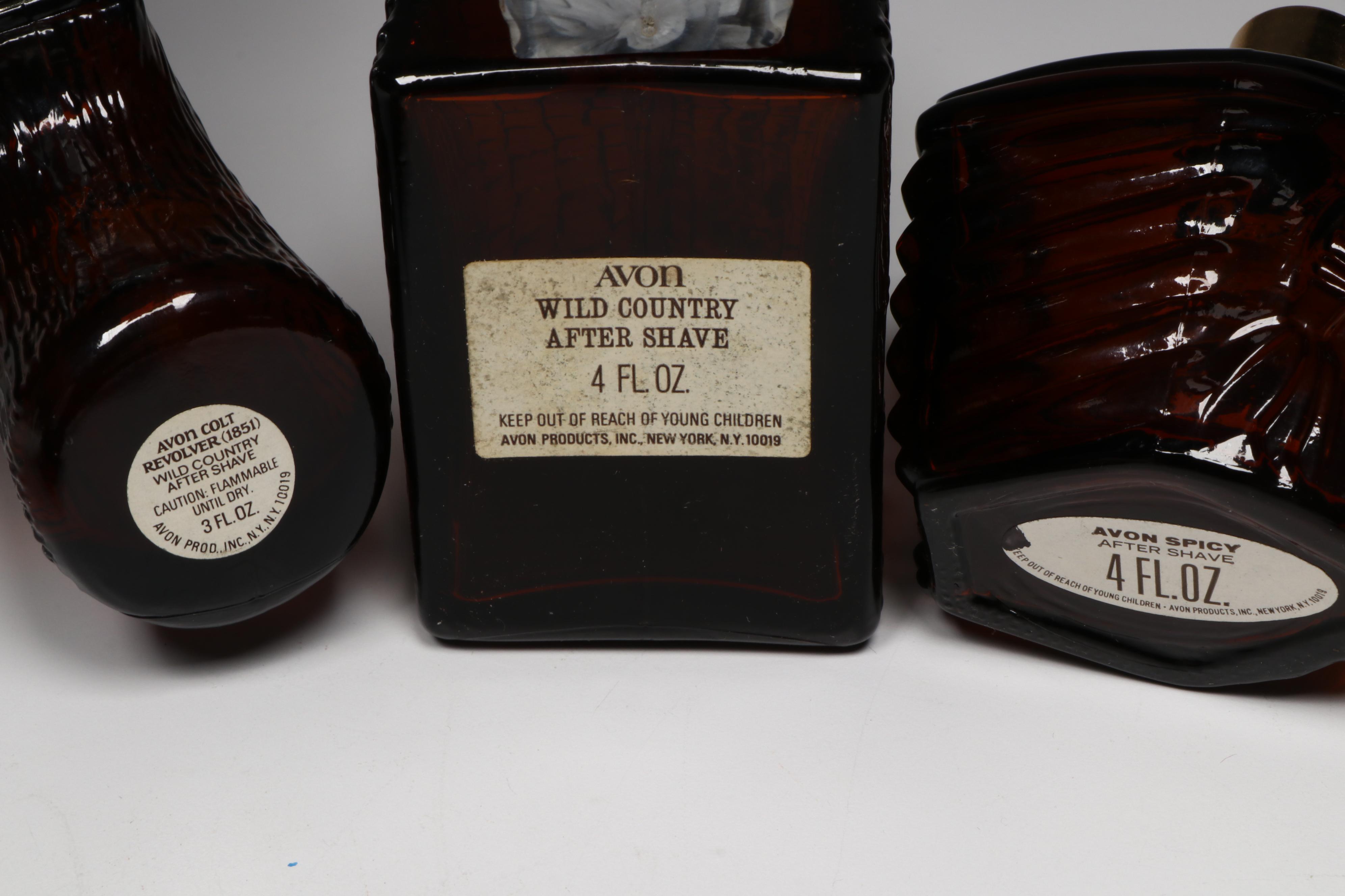 Avon Novelty Aftershave Bottles Including Revolver, Pheasant, and Totem Pole