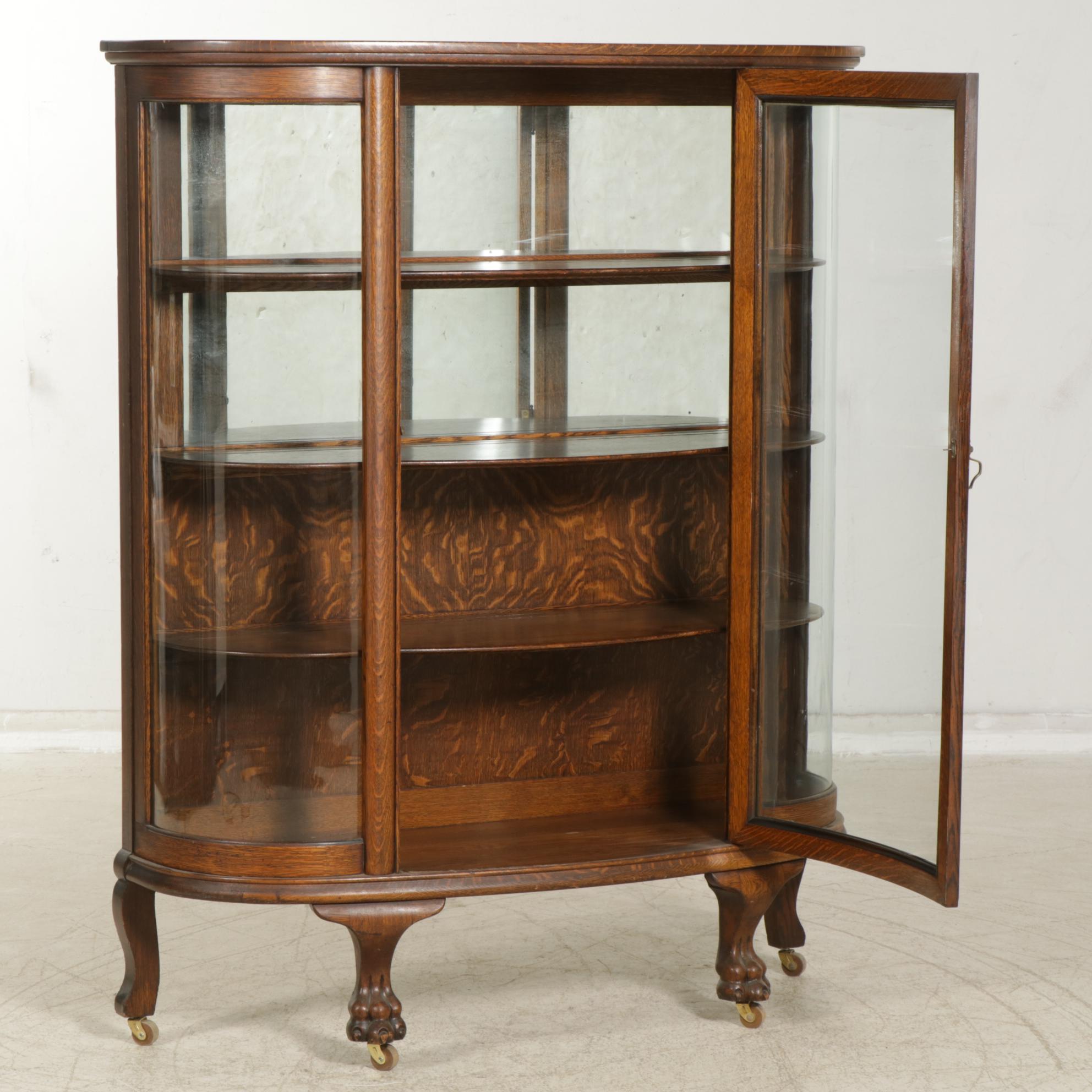 Victorian Oak Bow Front Display Cabinet with Lion's Paw Feet