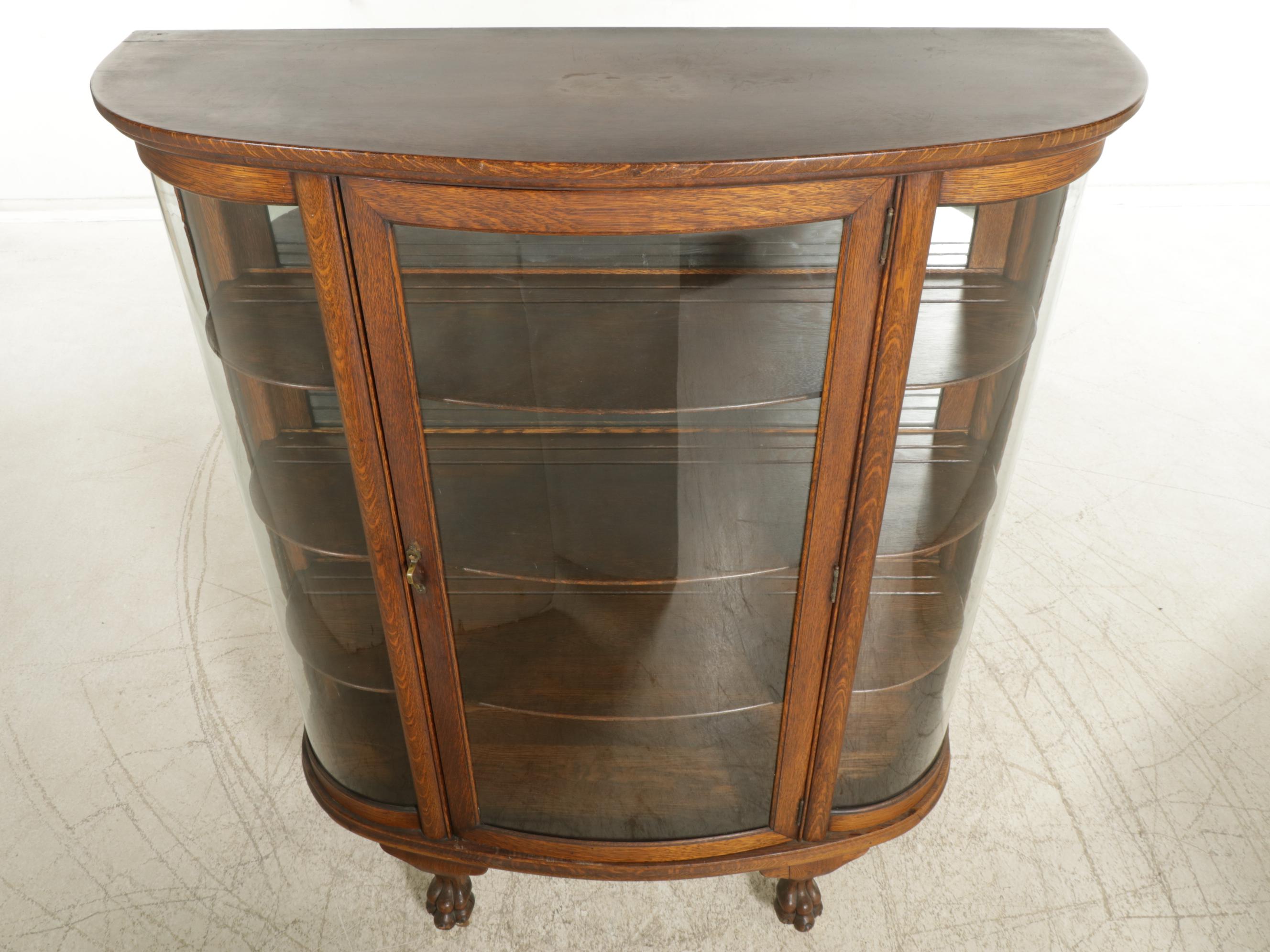 Victorian Oak Bow Front Display Cabinet with Lion's Paw Feet