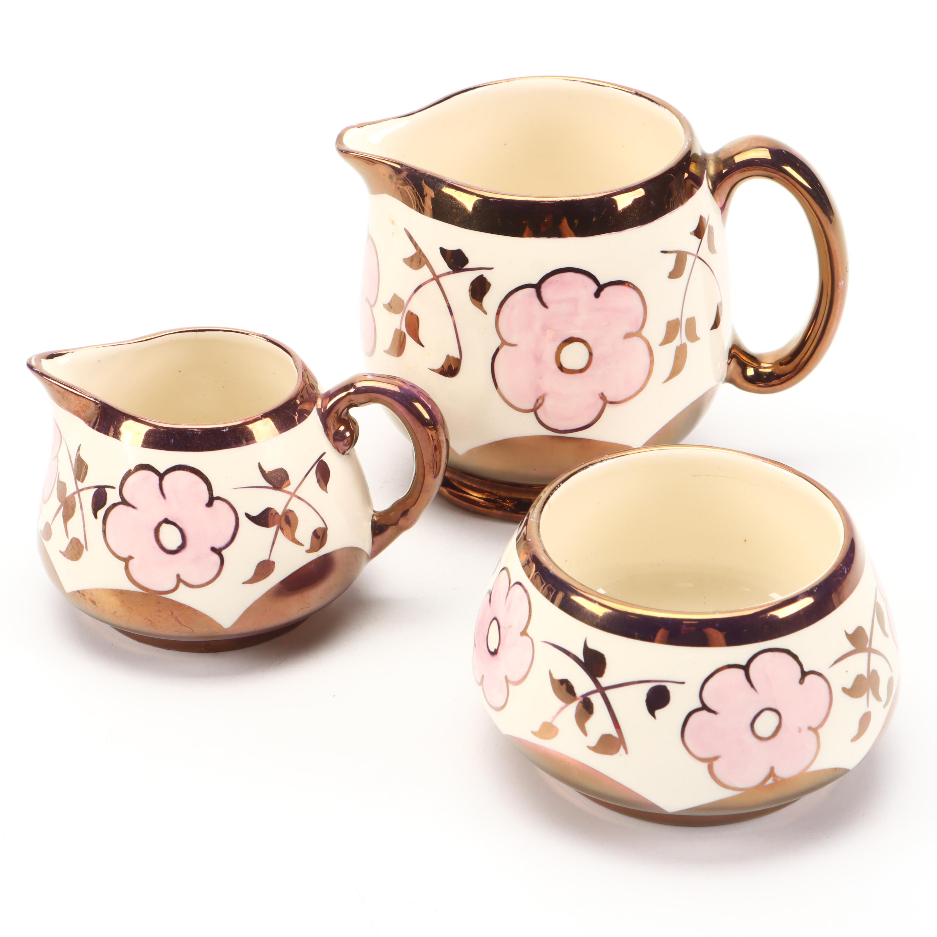 Lancasters Lusterware Floral Motif Ceramic Creamers and Sugar