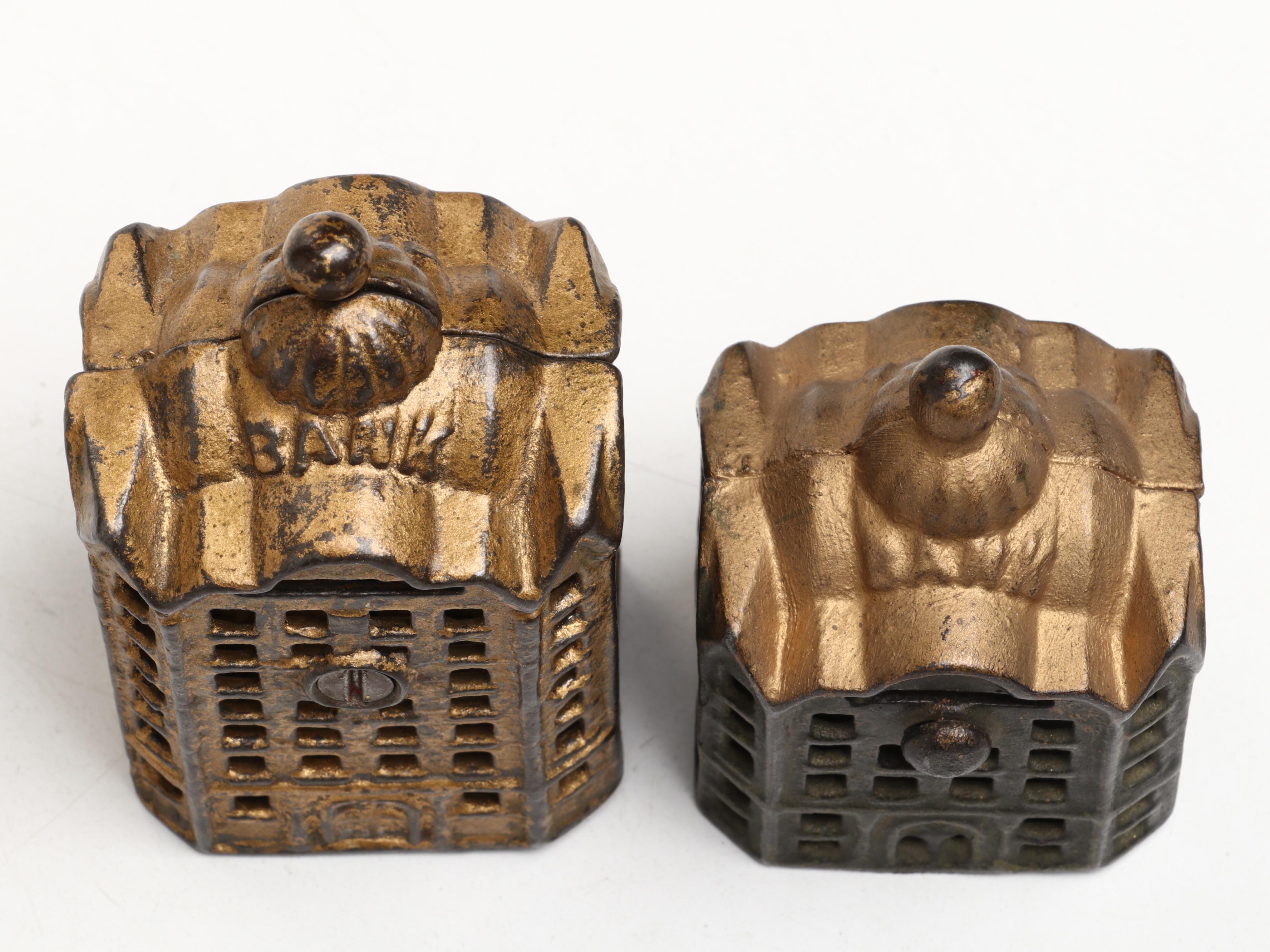 A. C. Williams Cast Iron Domed Banks, Early 20th Century