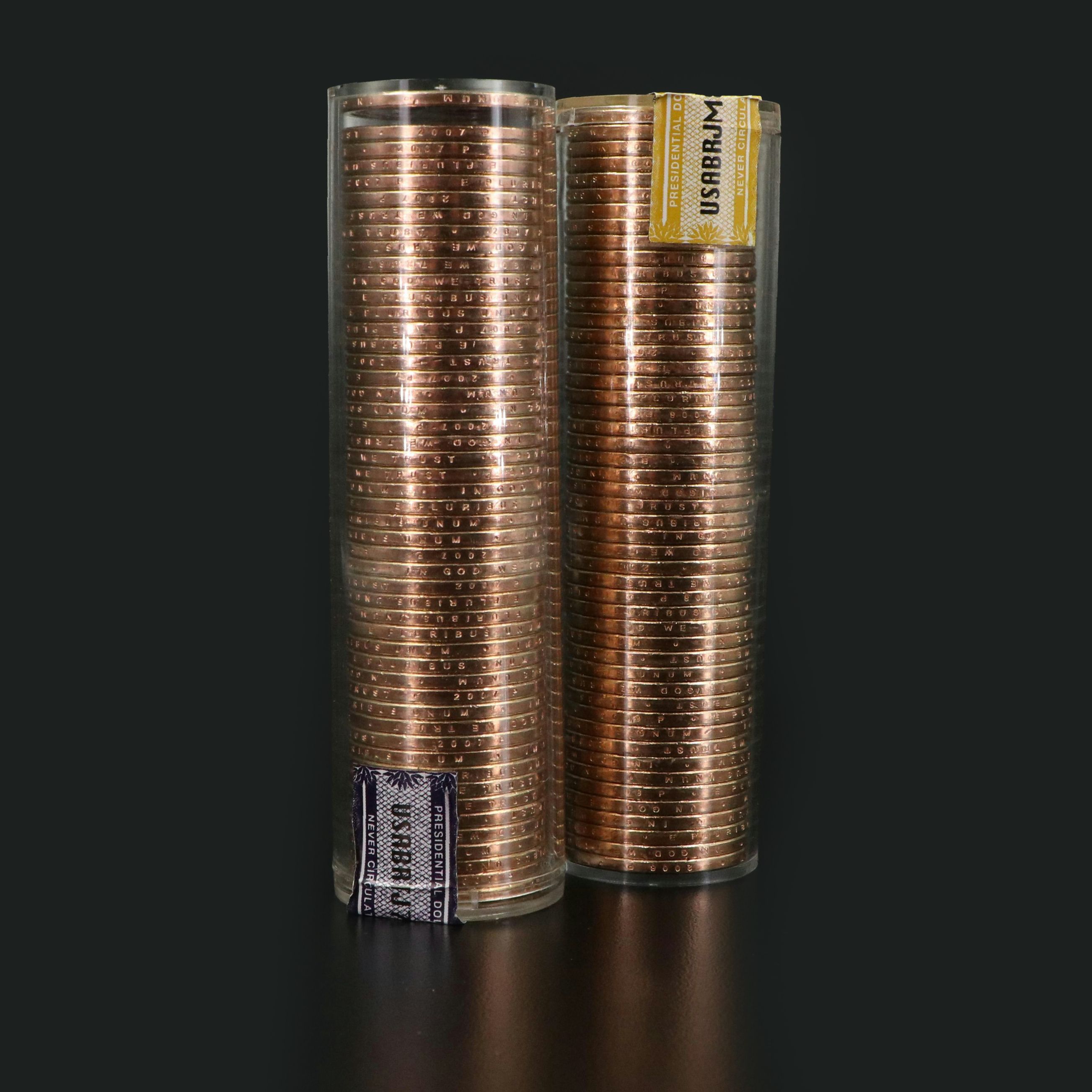 Two "Ballistic Rolls" of Uncirculated U.S. Presidential Dollars