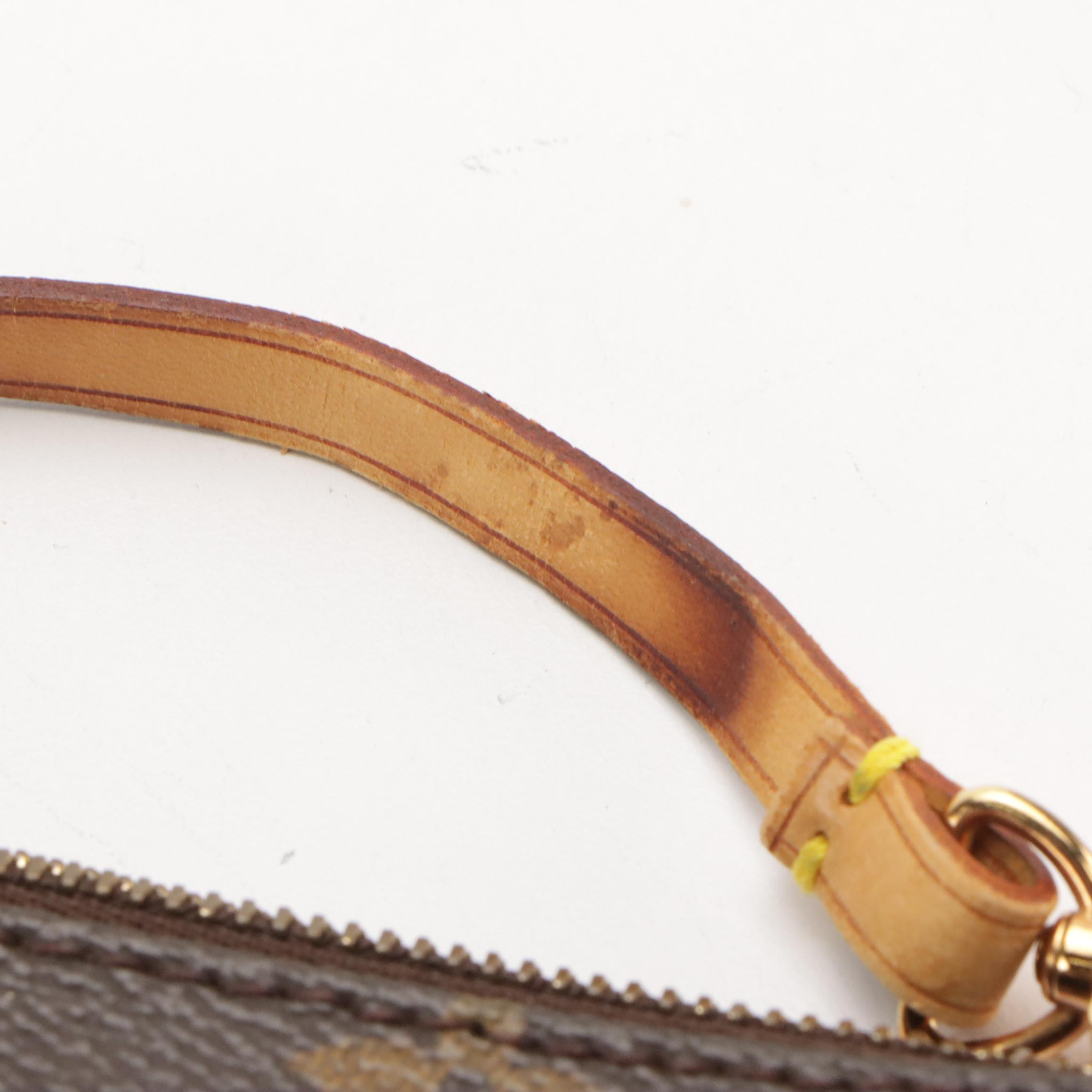 Louis Vuitton Zip Pochette Bag in Monogram Canvas and Leather