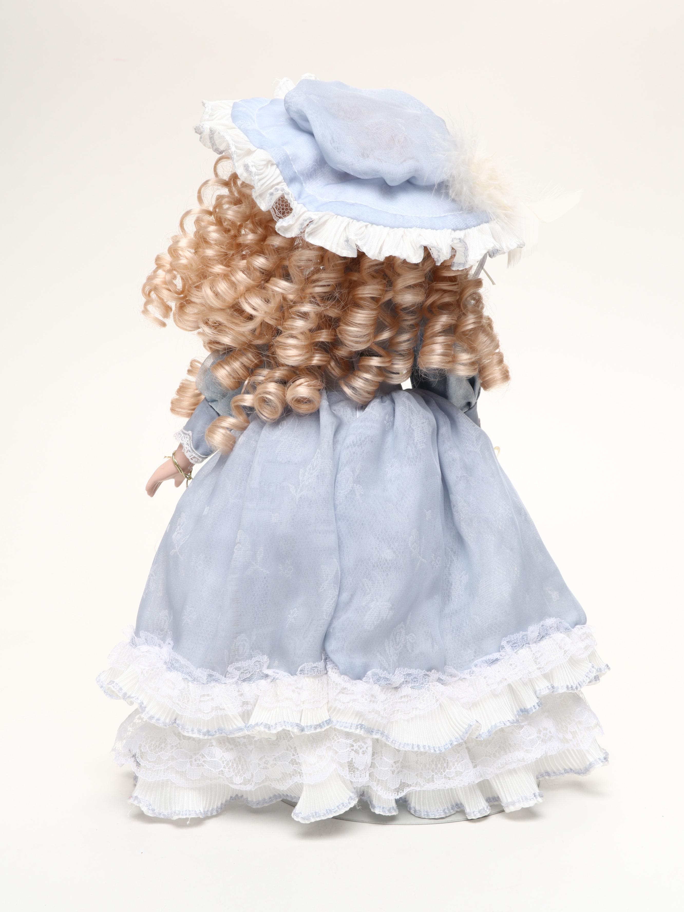 Pair of Emerald Doll Collection Porcelain Dolls, 2004