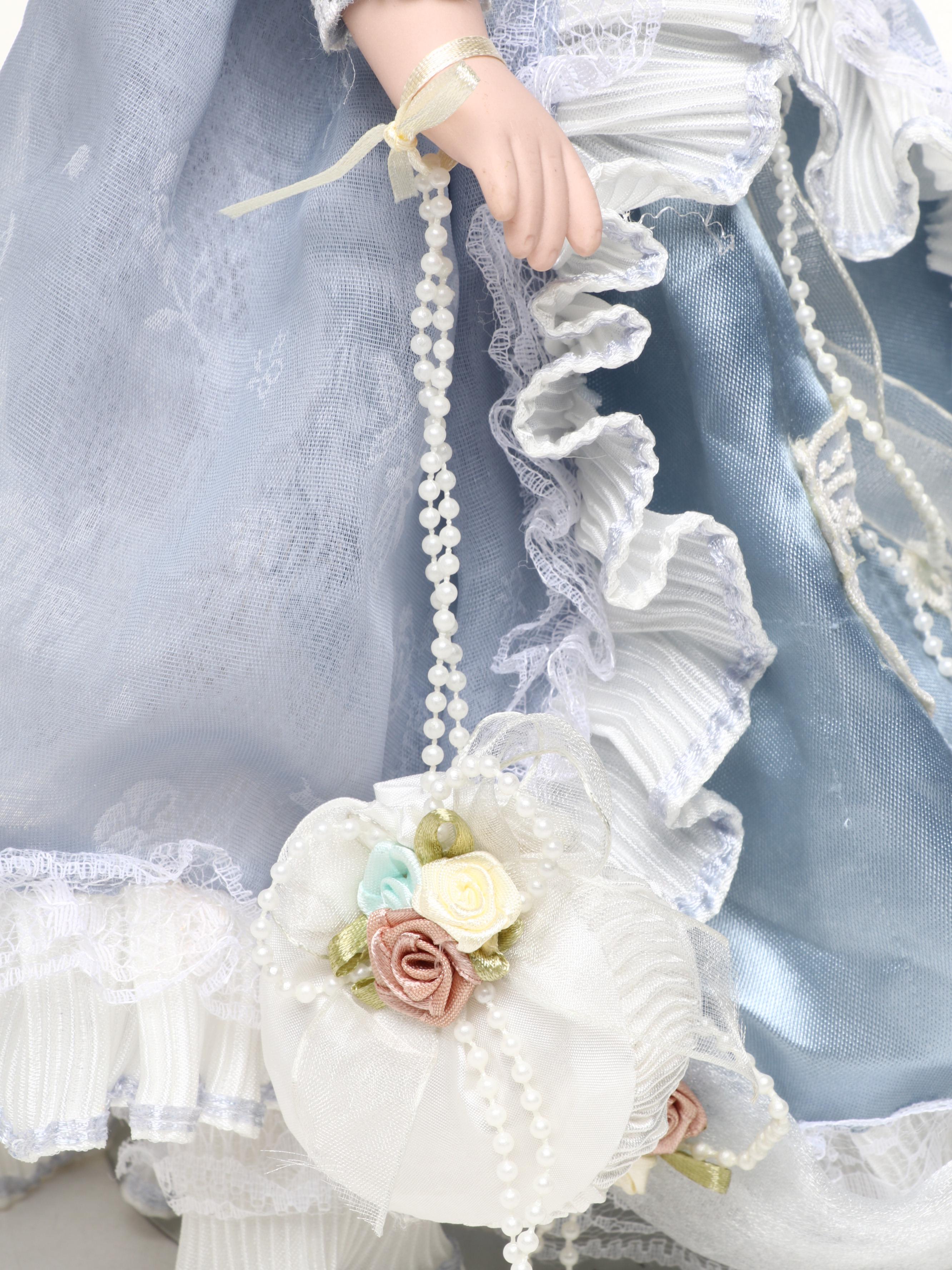 Pair of Emerald Doll Collection Porcelain Dolls, 2004