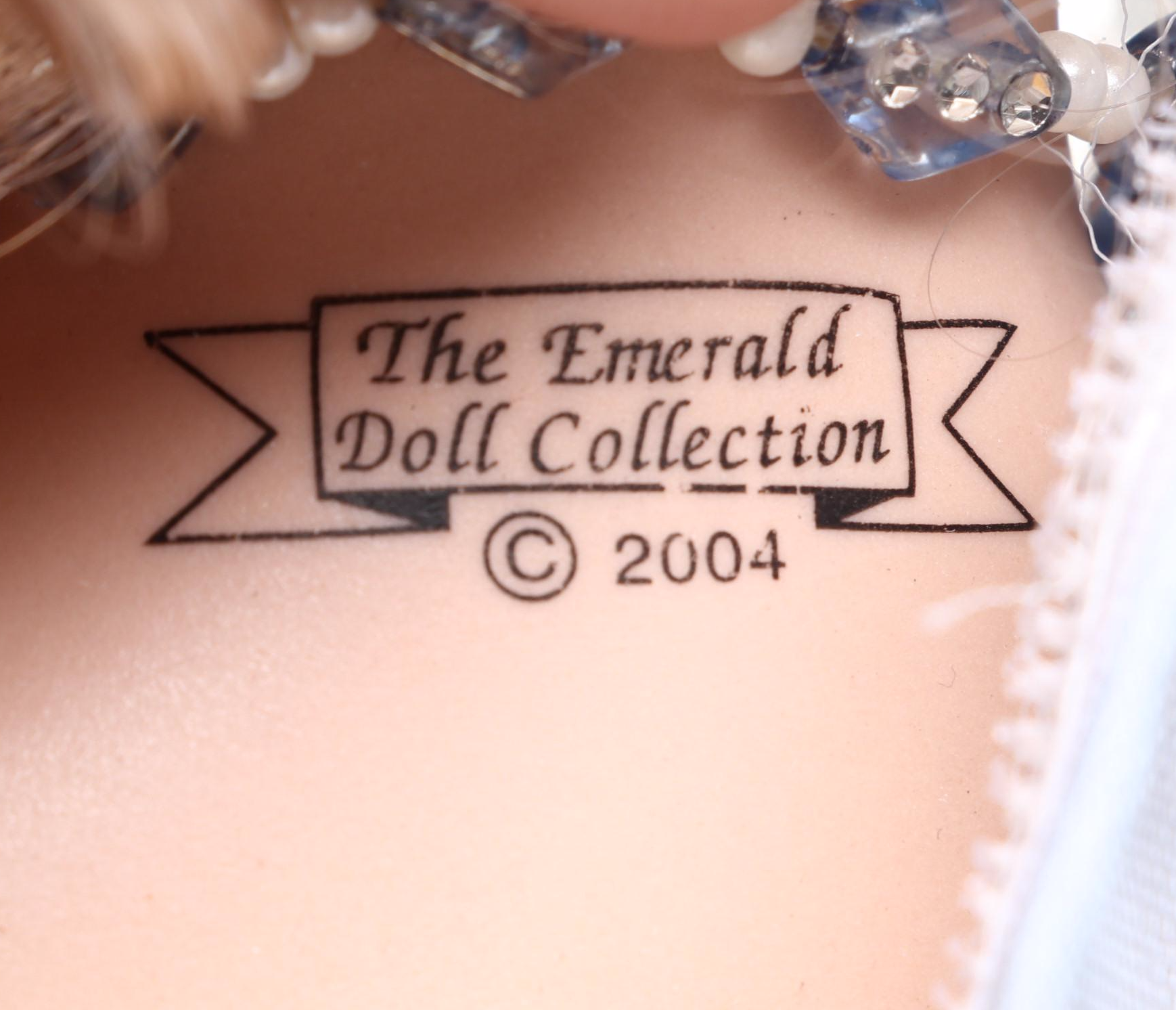 Pair of Emerald Doll Collection Porcelain Dolls, 2004