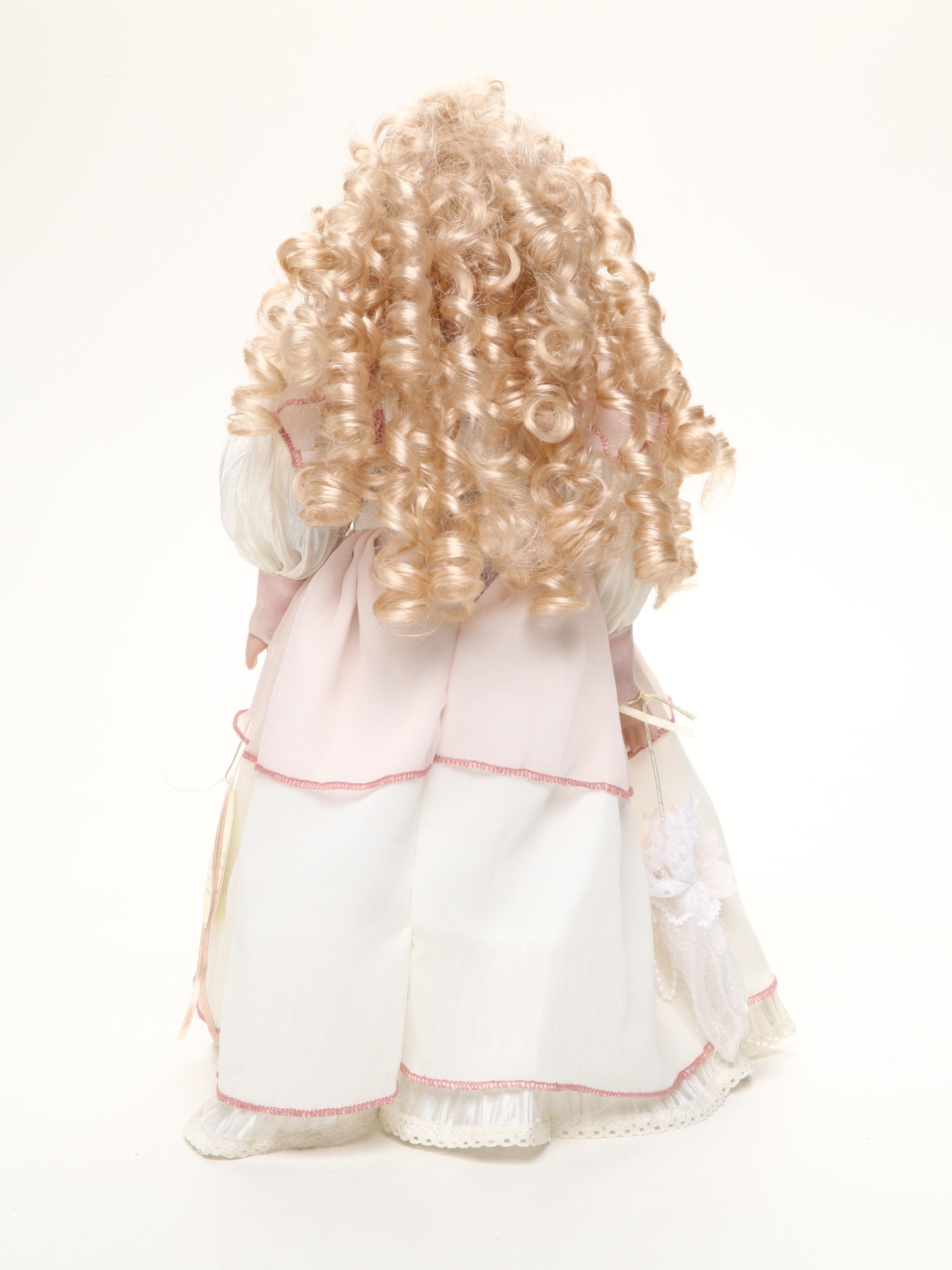 Pair of Emerald Doll Collection Porcelain Dolls, 2004