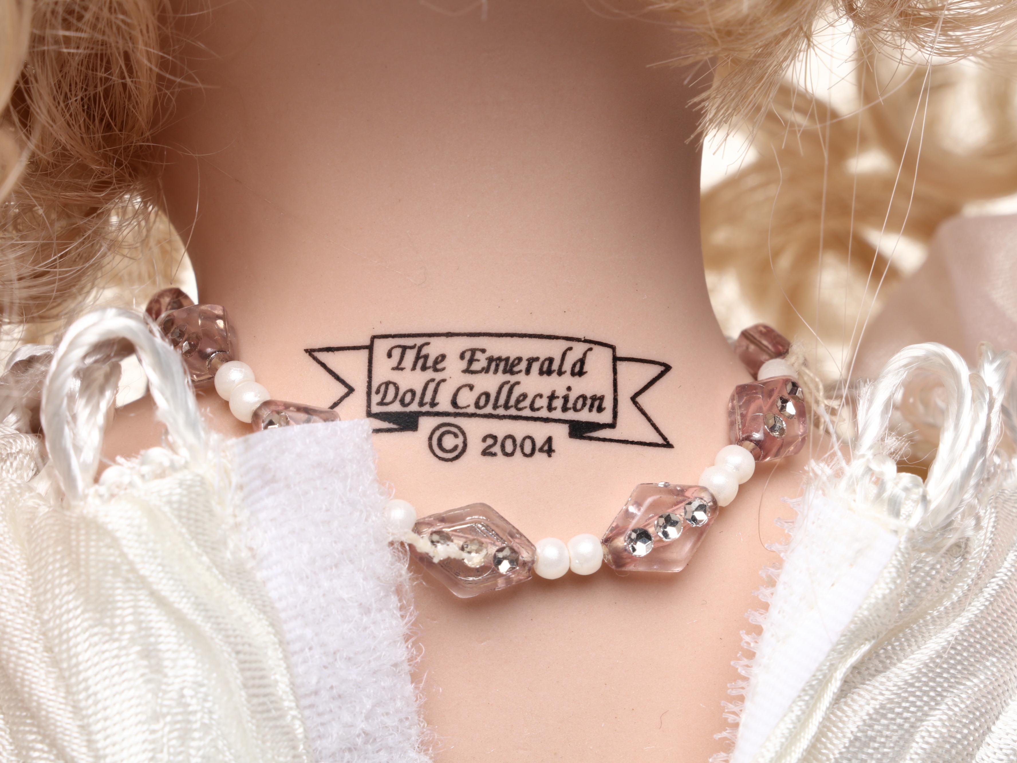 Pair of Emerald Doll Collection Porcelain Dolls, 2004