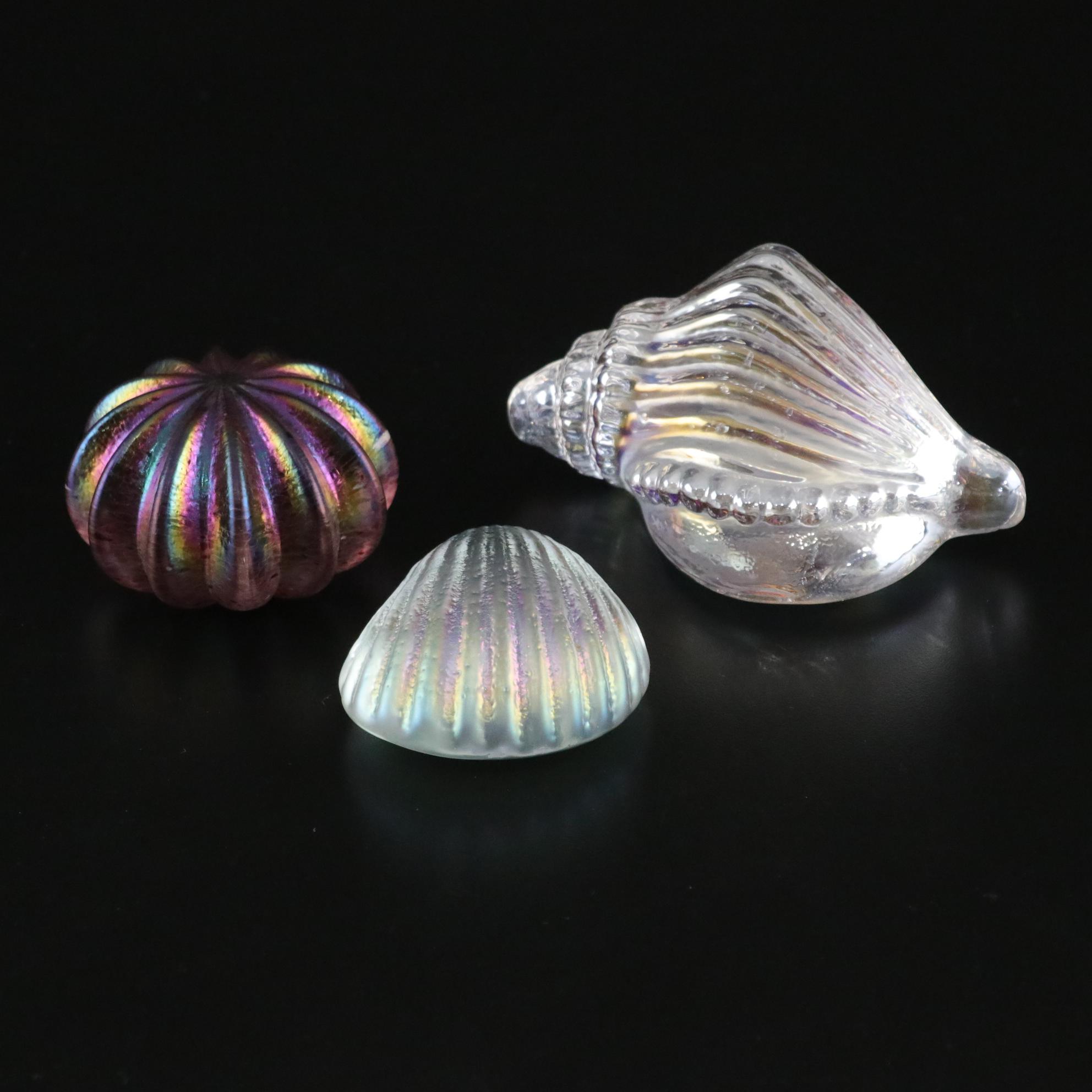 Robert Held Art Glass Paperweights Featured in Iridescent Shell Motif Collection