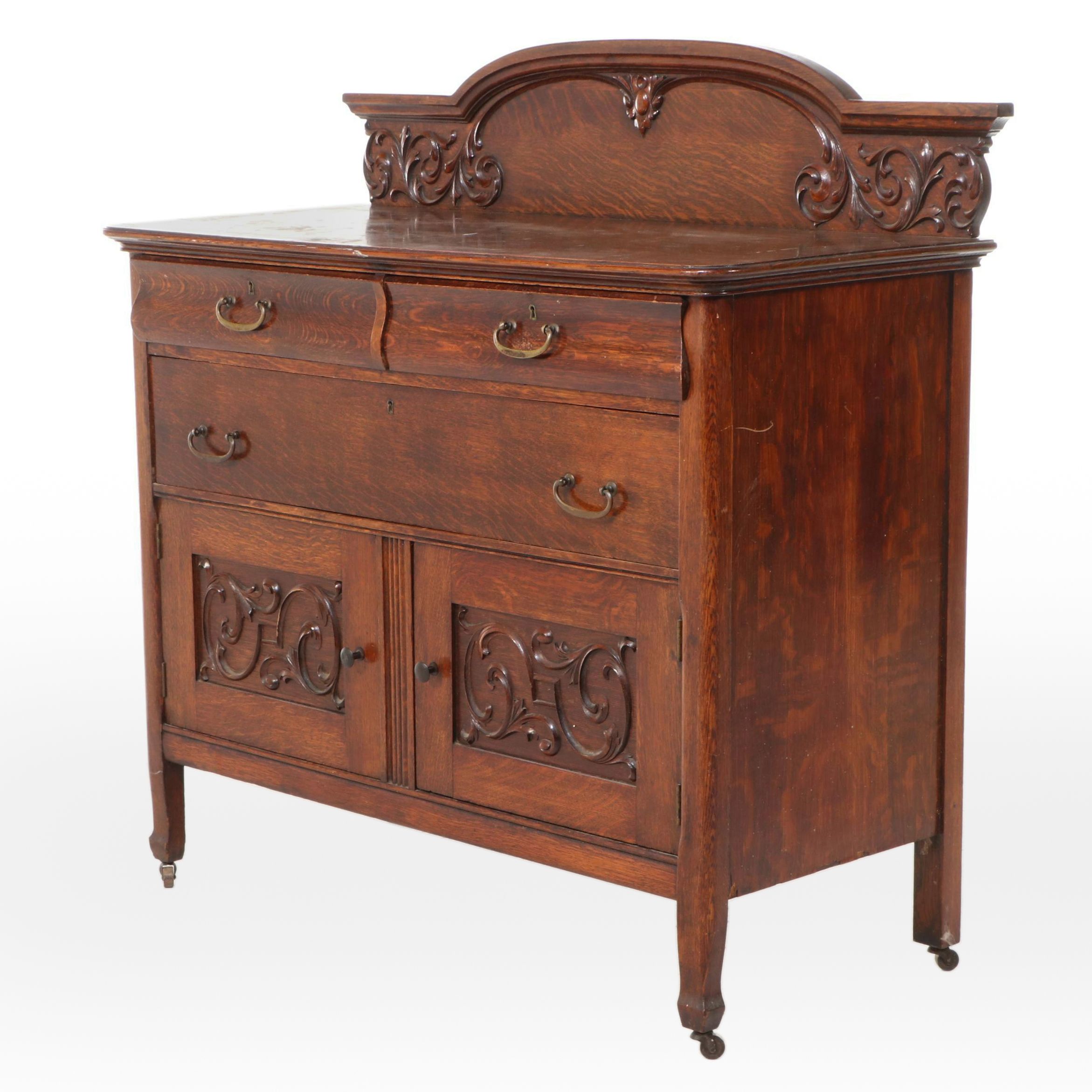 American Empire Revival Carved and Quartersawn Oak Buffet, Late 19th Century