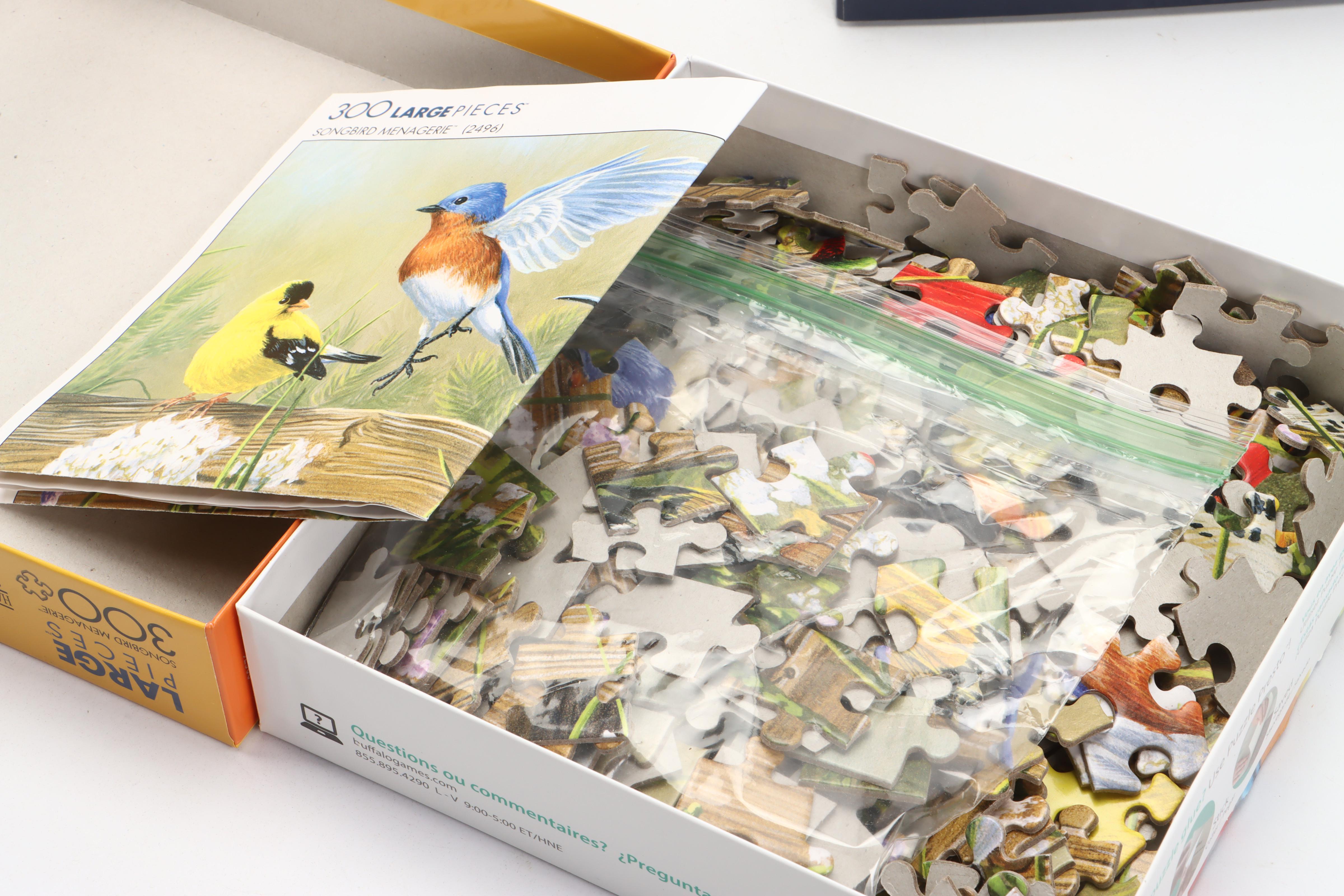 Buffalo "Songbird Menagerie," Galison "Dogs with Jobs" and More Puzzles