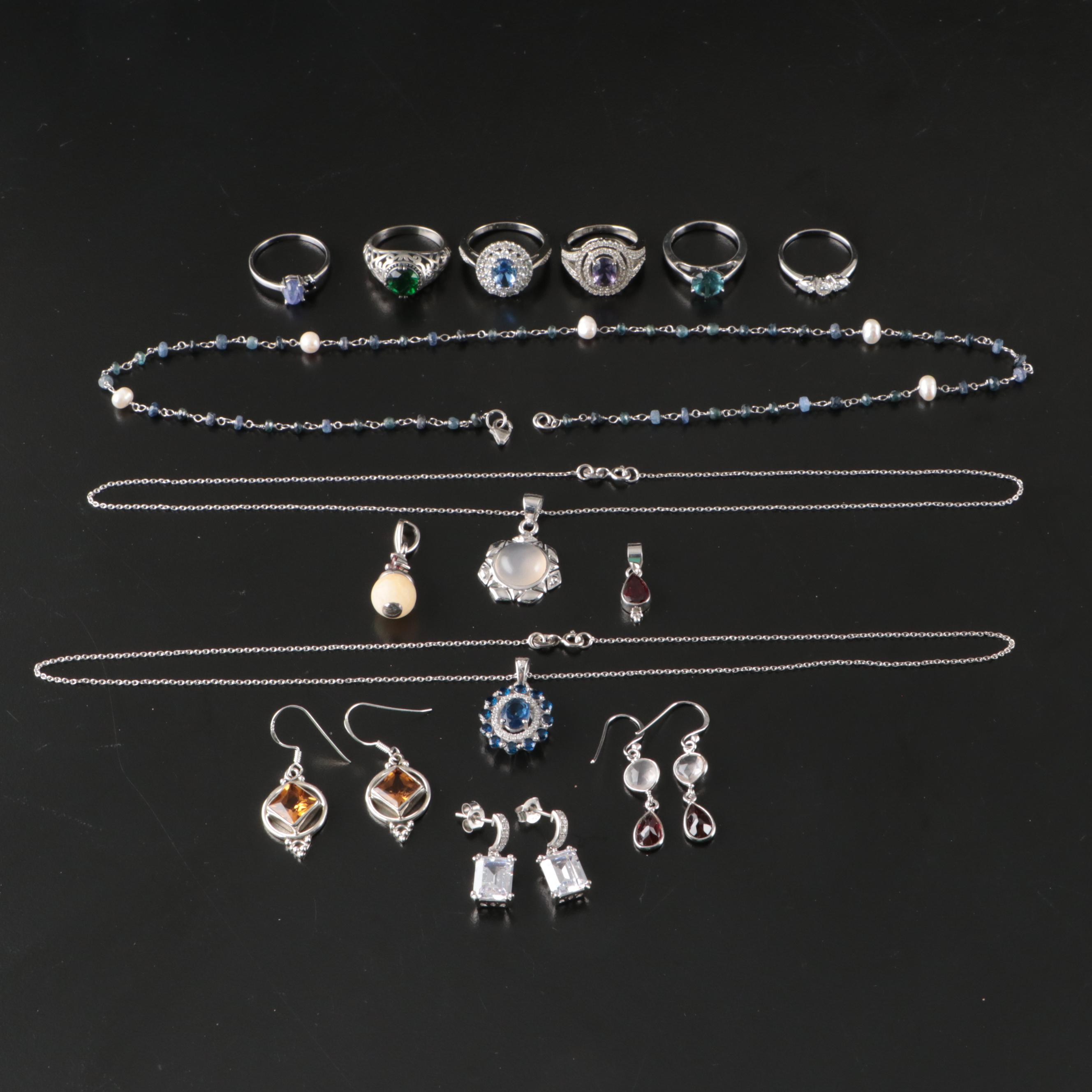 Group of 14 Assorted Sterling Silver Rings, Necklaces, Earrings, and Pendants