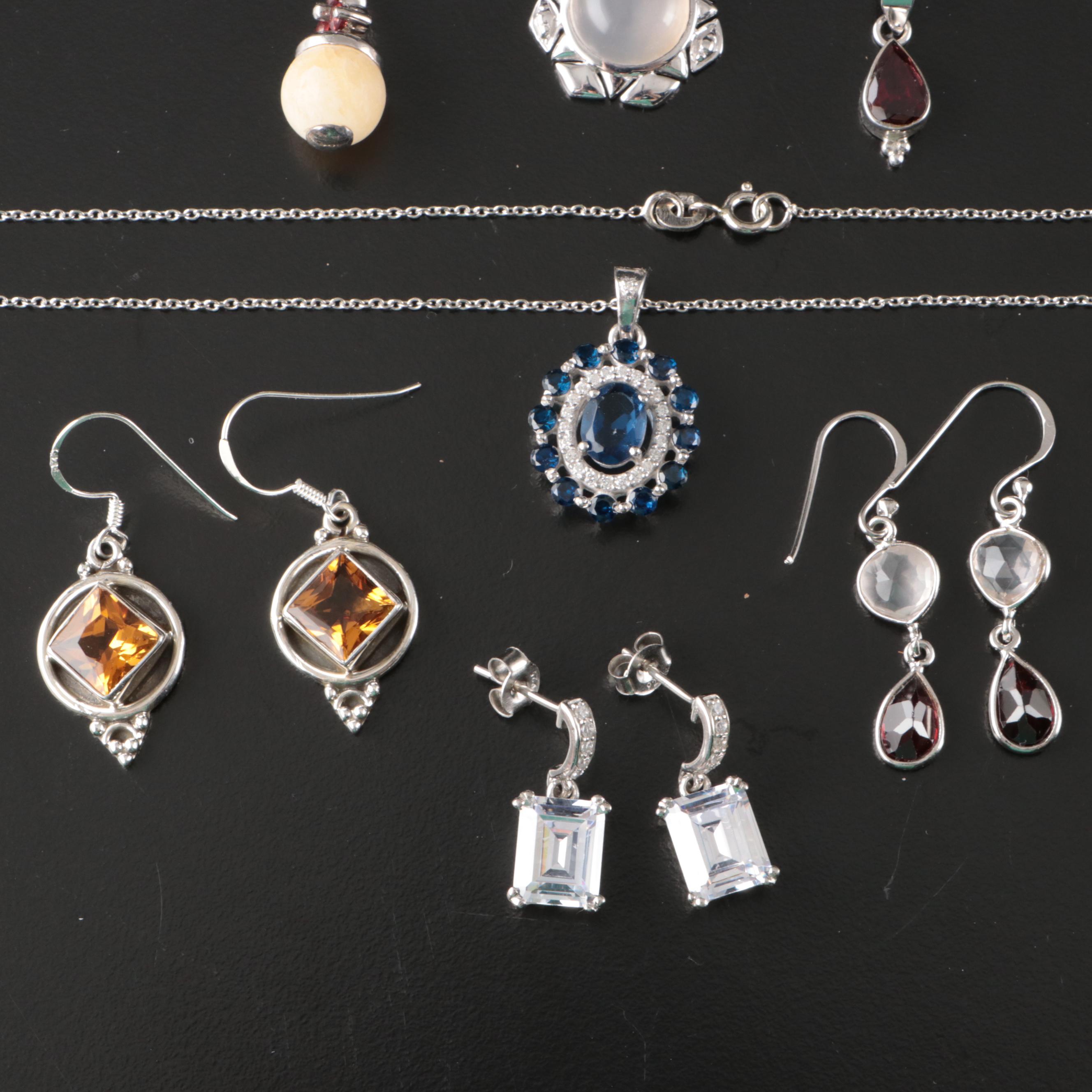 Group of 14 Assorted Sterling Silver Rings, Necklaces, Earrings, and Pendants