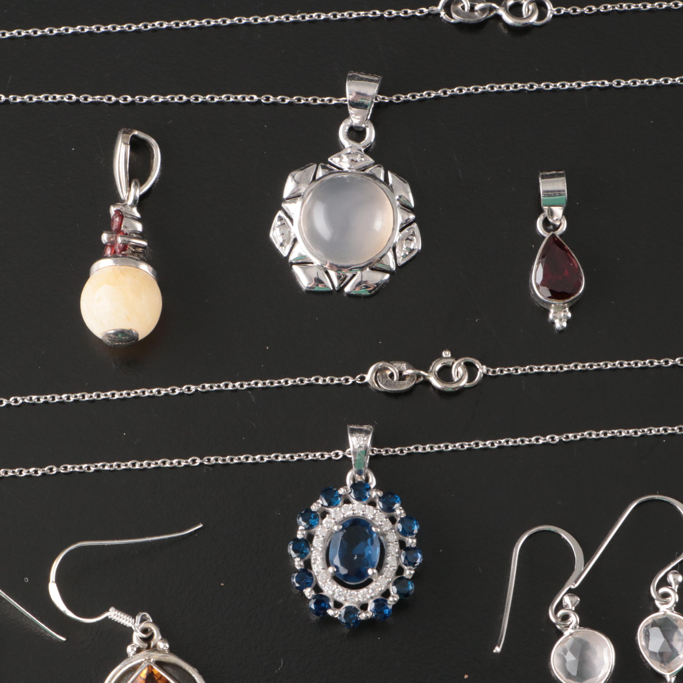 Group of 14 Assorted Sterling Silver Rings, Necklaces, Earrings, and Pendants