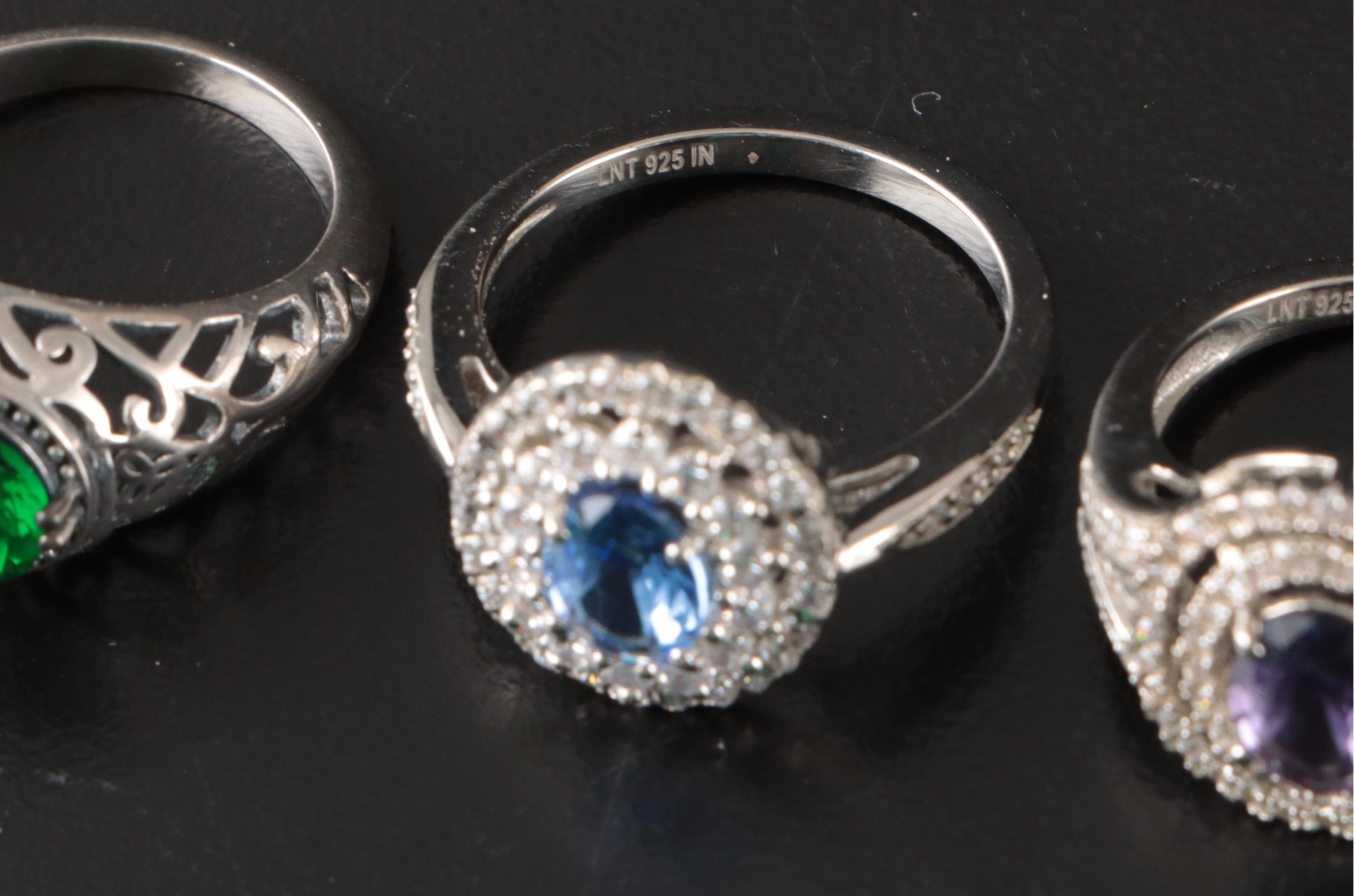 Group of 14 Assorted Sterling Silver Rings, Necklaces, Earrings, and Pendants