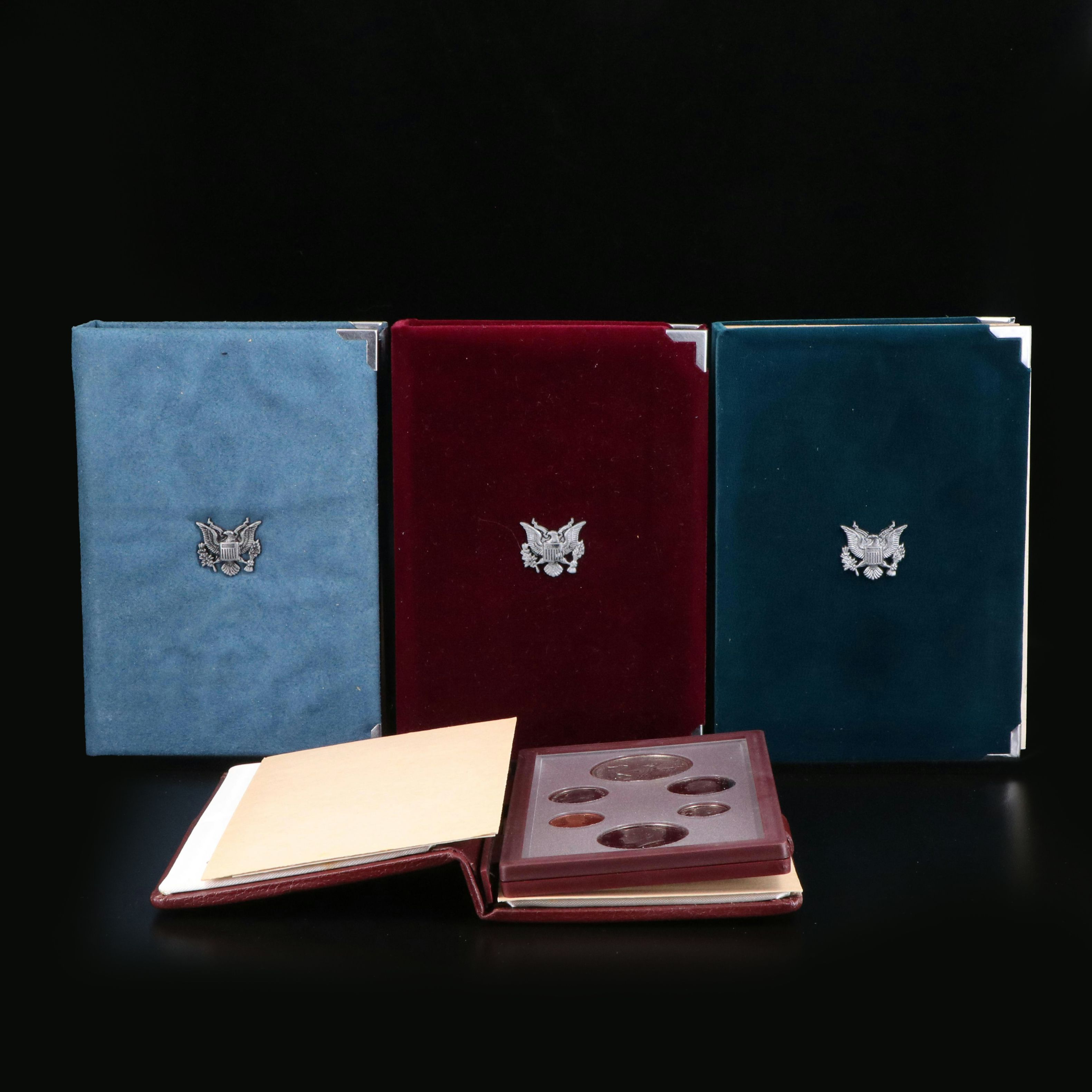 Group of Four U.S. Prestige Proof Sets 1984, 1987, 1988, and 1990