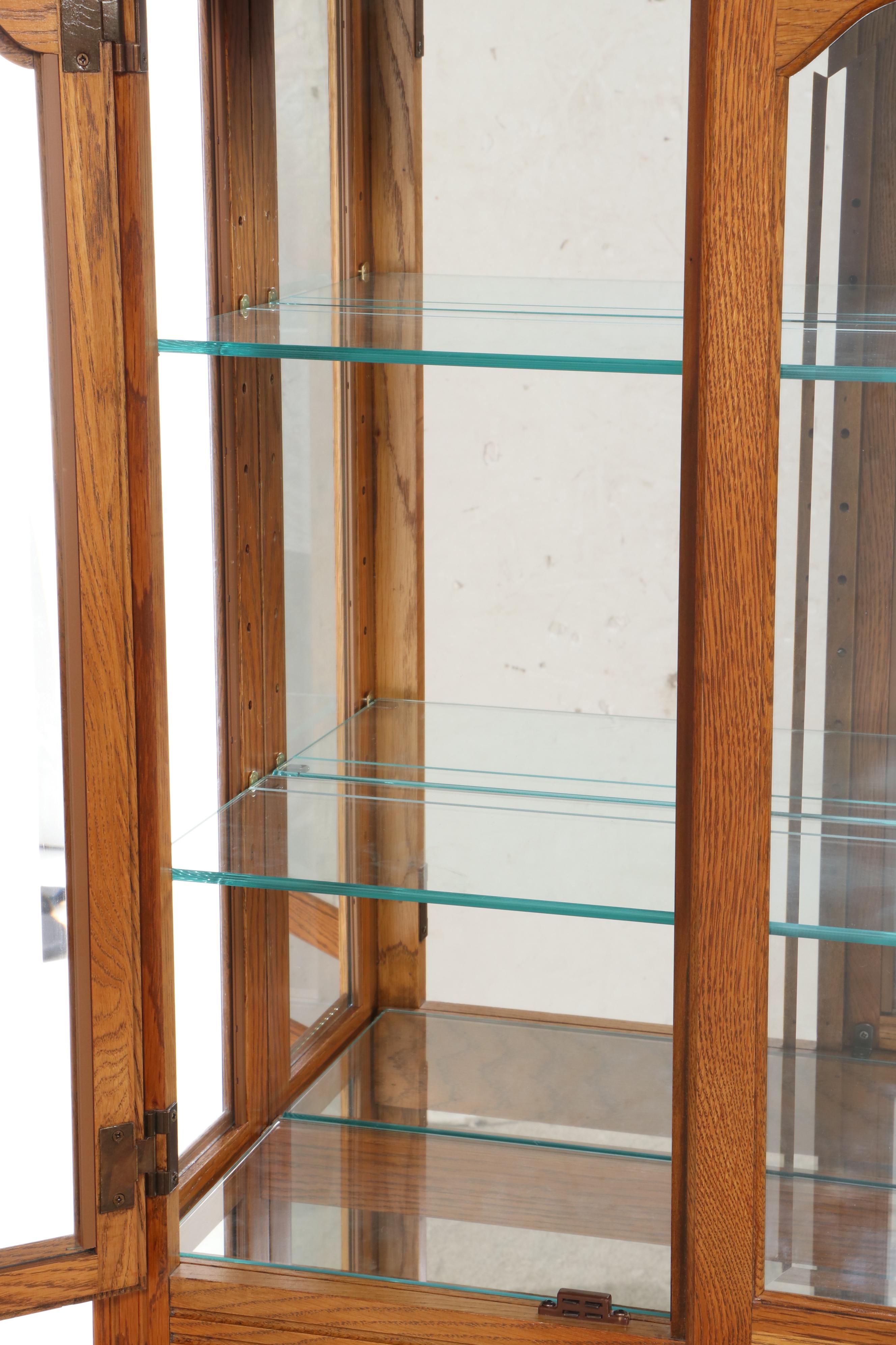 Pulaski Furniture Colonial Style Oak Illuminated Glass Front Curio Cabinet