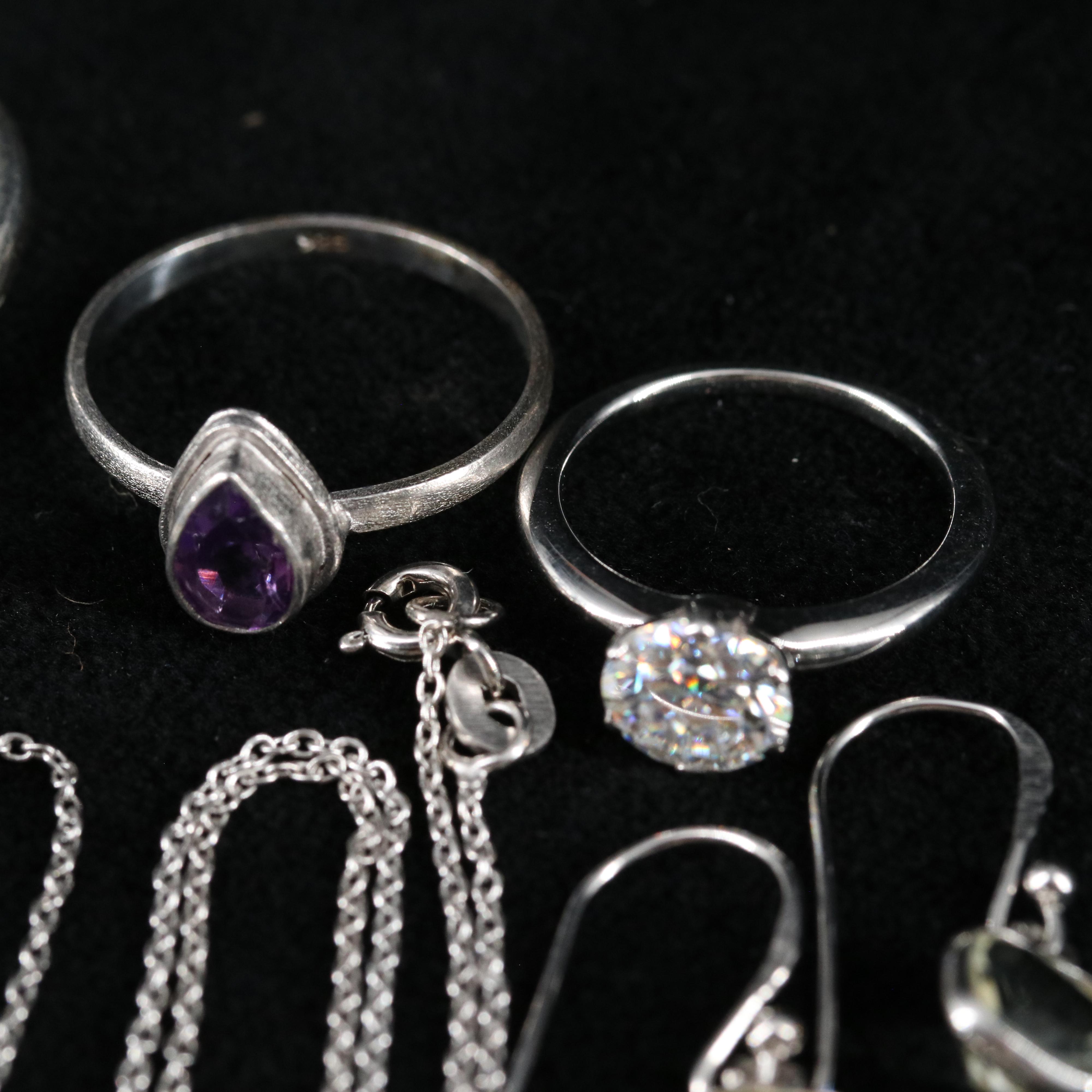 Group of 14 Assorted Sterling Silver Rings, Necklaces, and Earrings