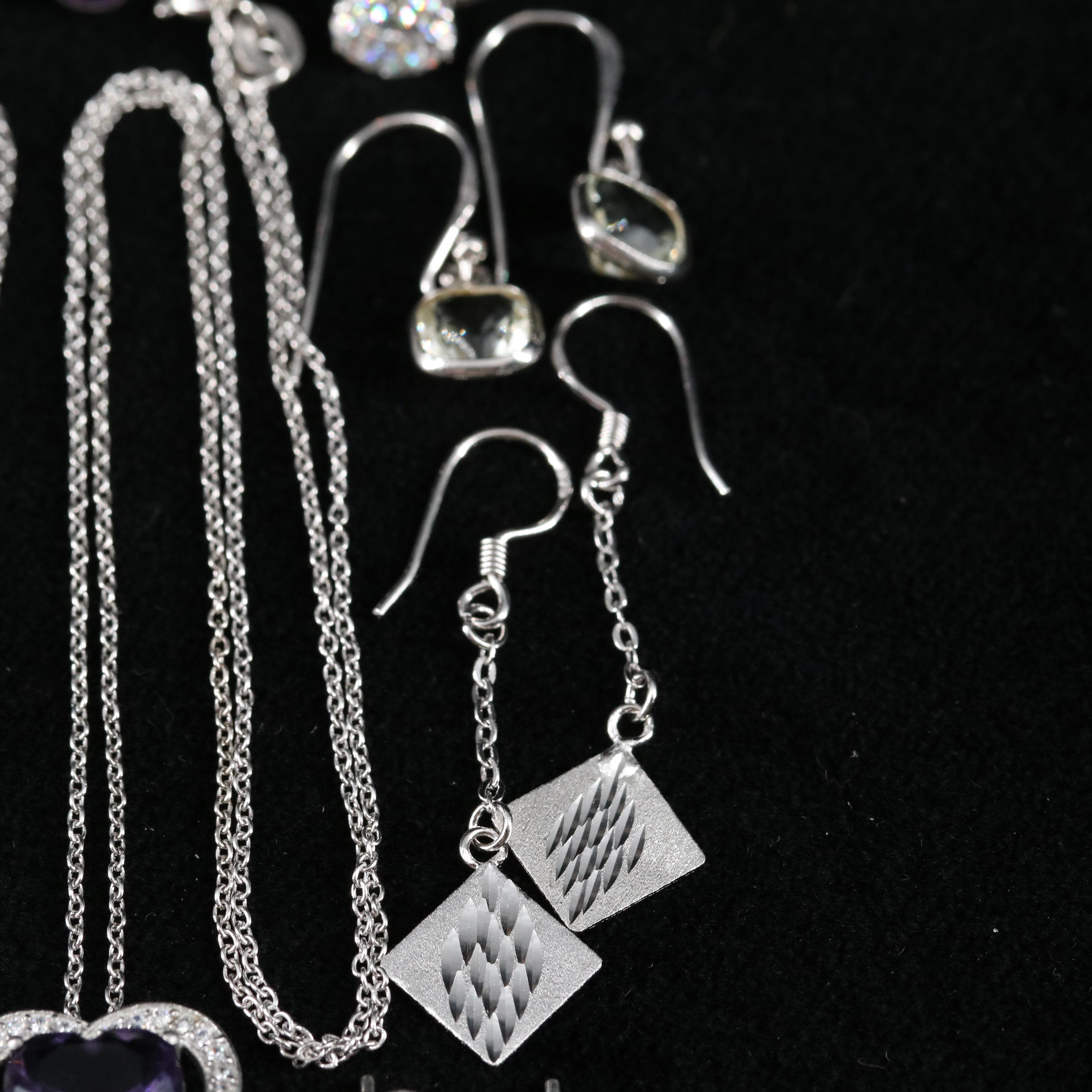 Group of 14 Assorted Sterling Silver Rings, Necklaces, and Earrings