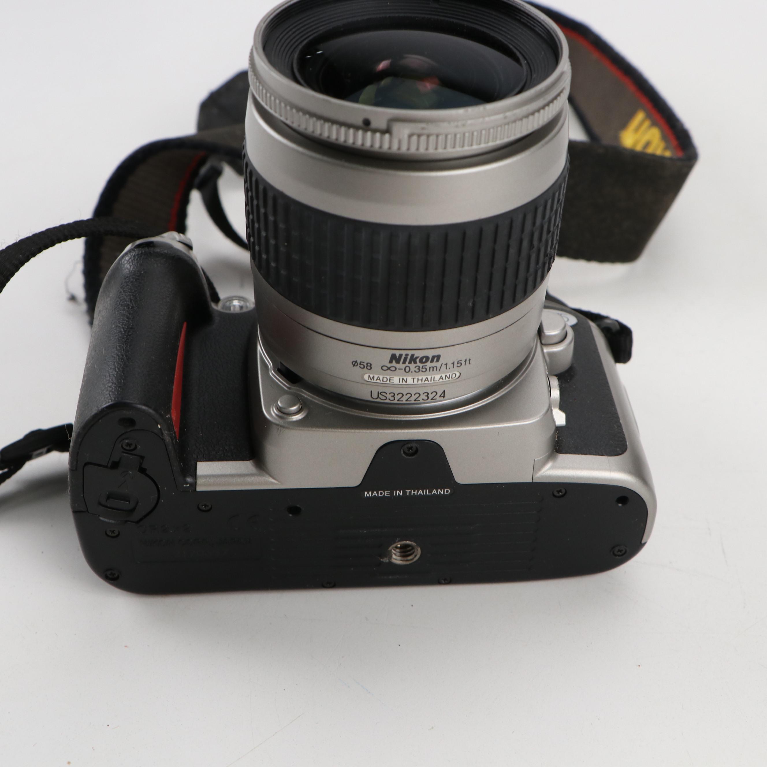 Nikon N75 and Canon Ftb Cameras with Lenses, Bag and Film