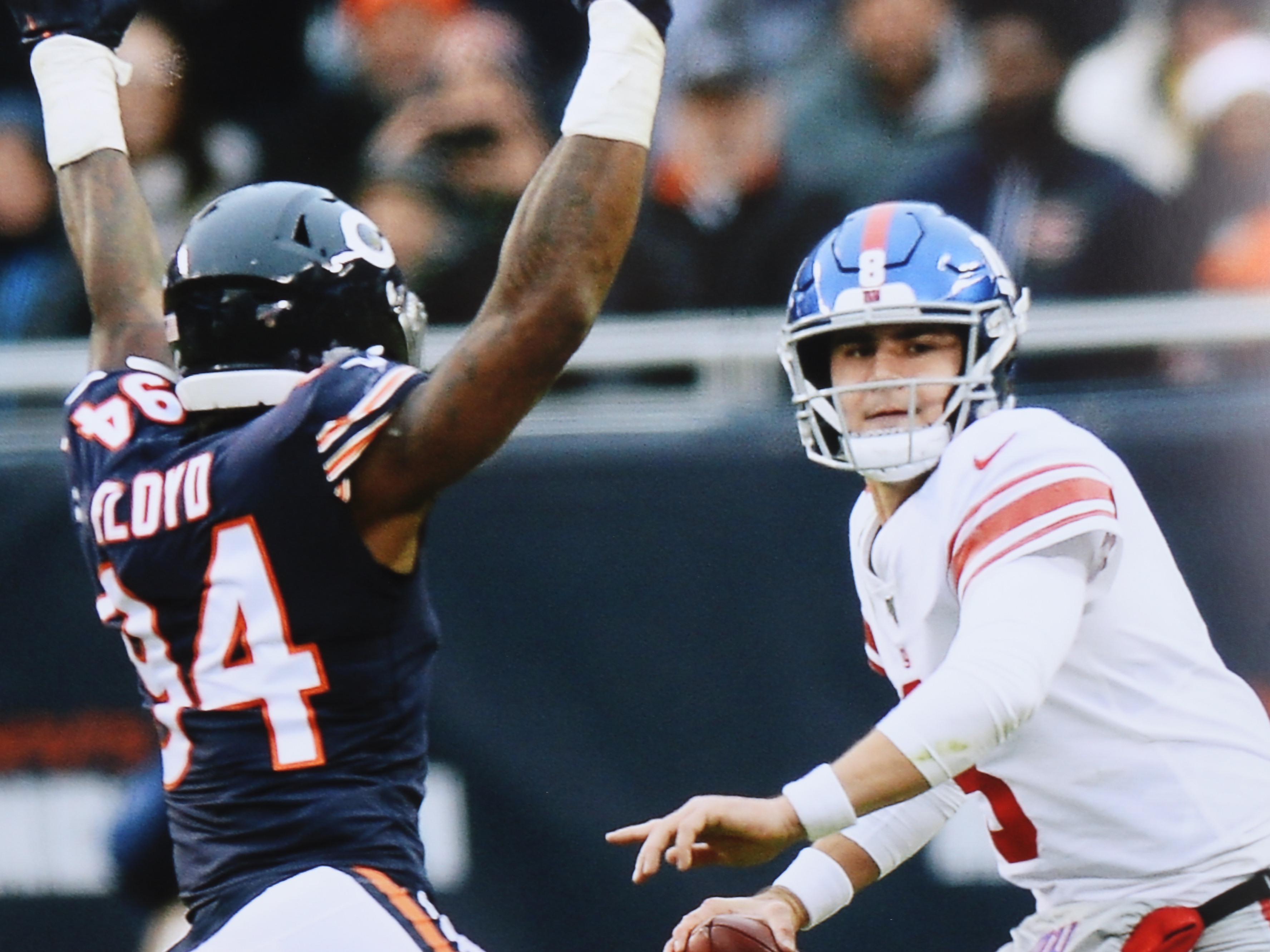 Nine NFL Photo Prints and Posters