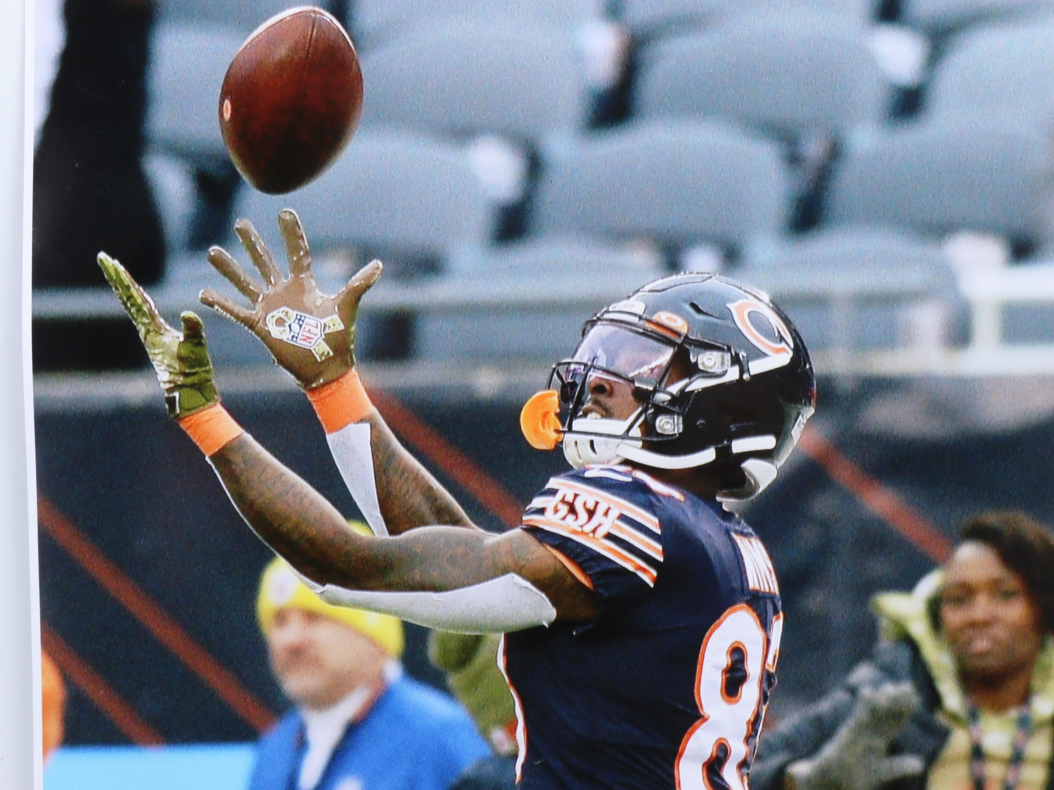 Nine NFL Photo Prints and Posters