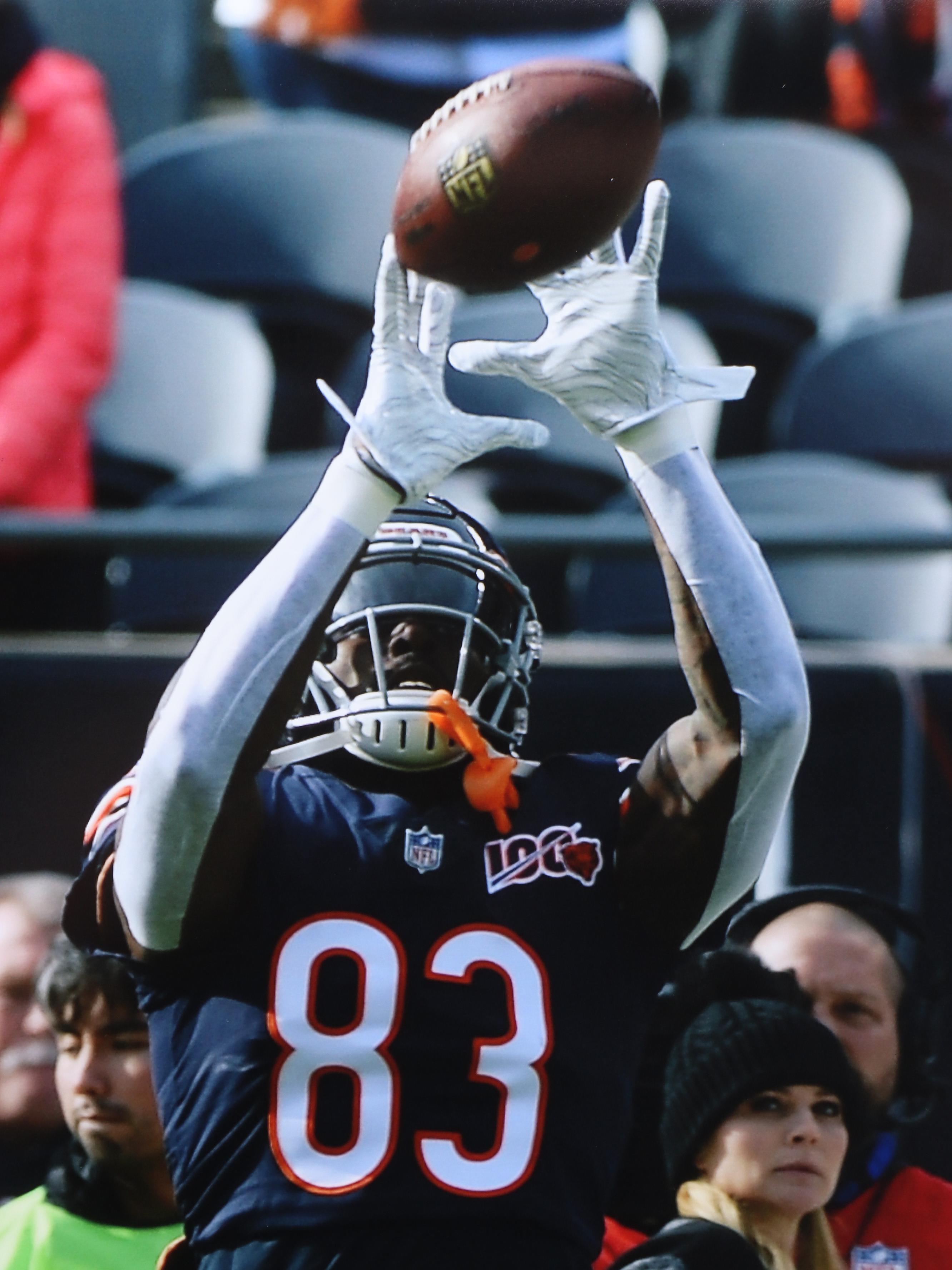 Nine NFL Photo Prints and Posters